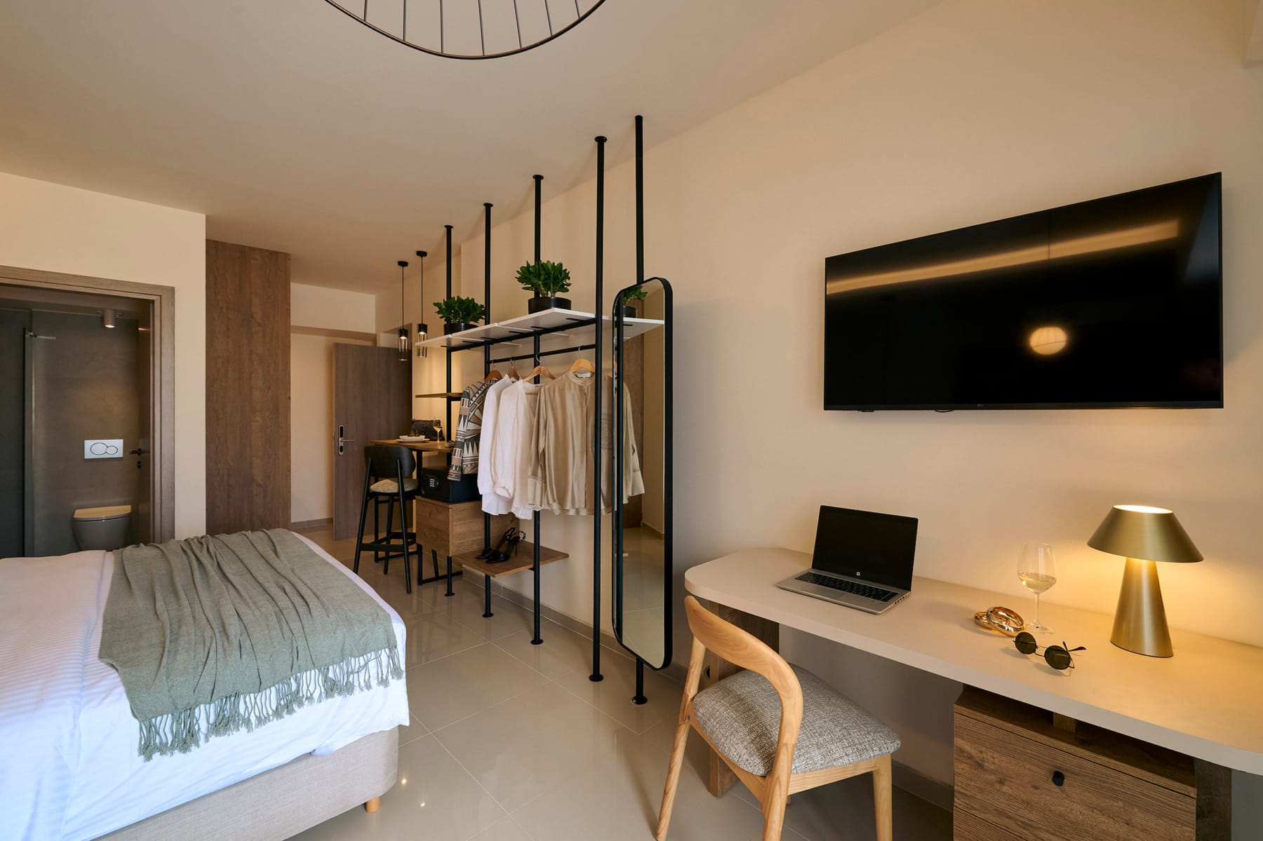 a room with a bed and a desk
