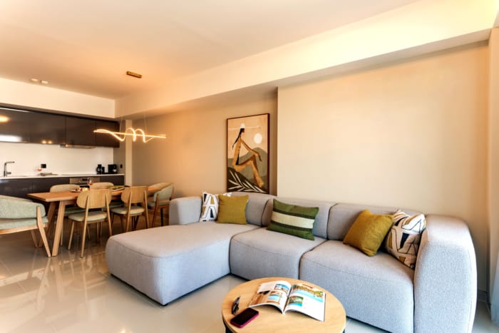 a living room with a couch and a table
