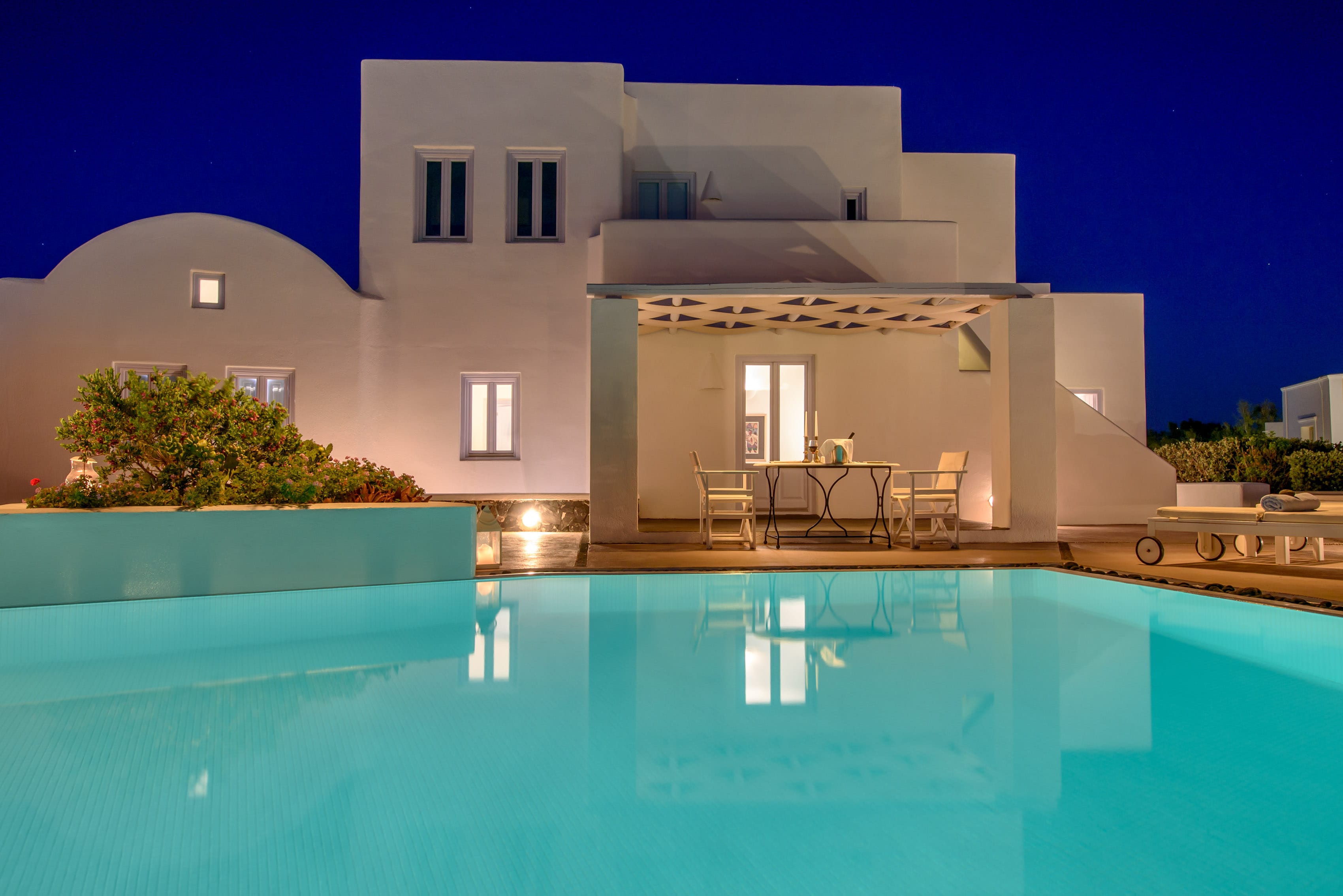 a pool in front of a house