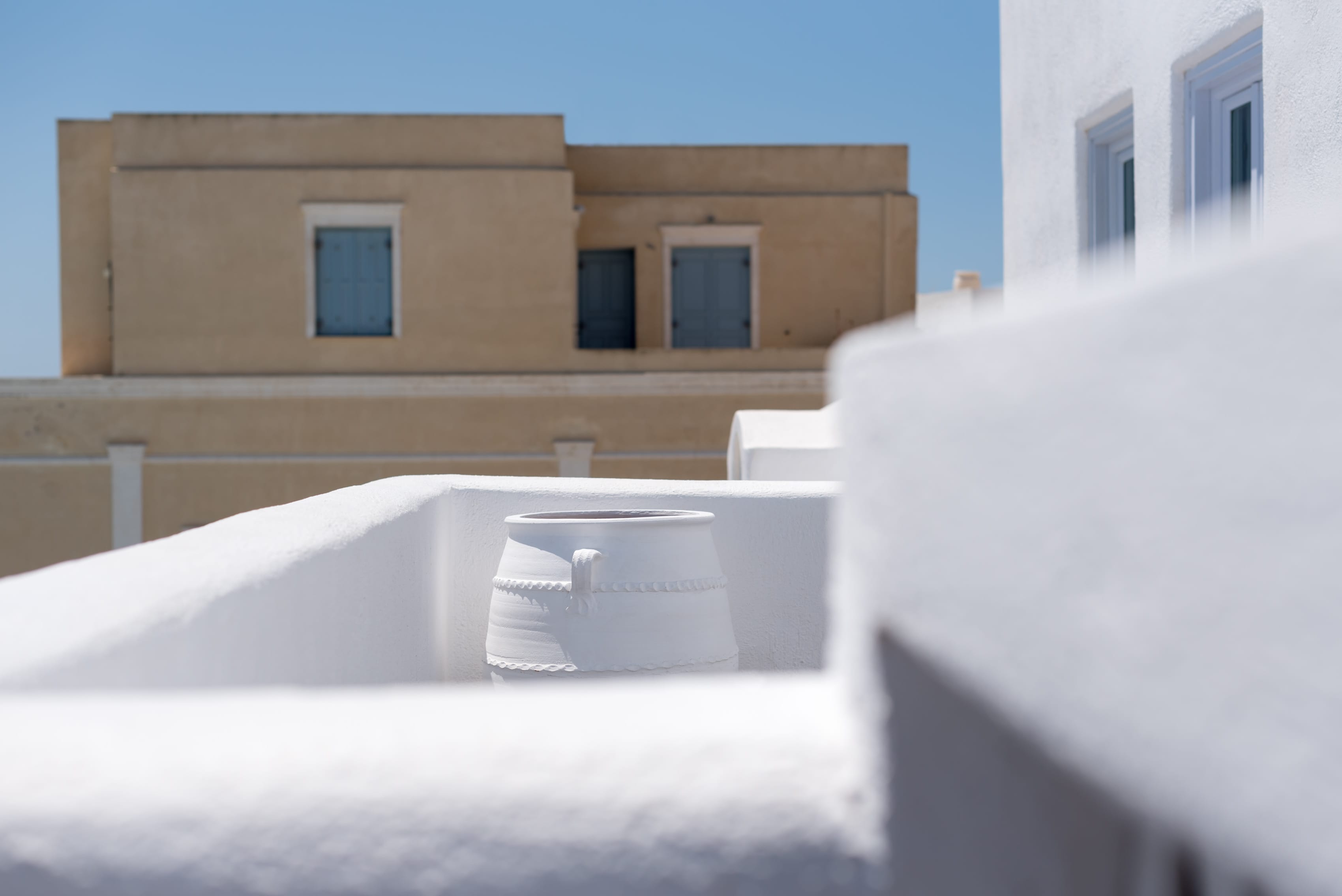 a white building with blue windows