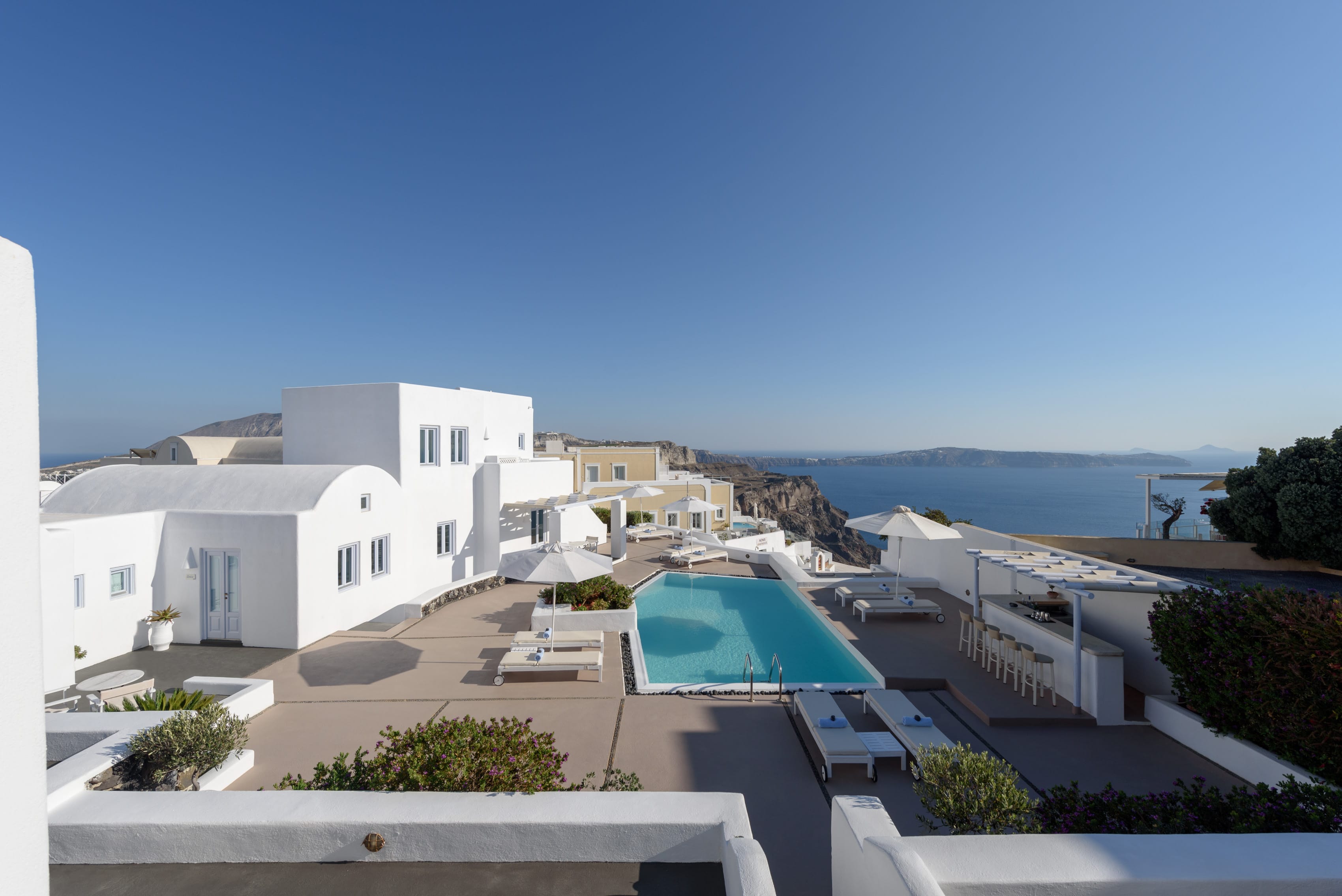 a swimming pool in a white building