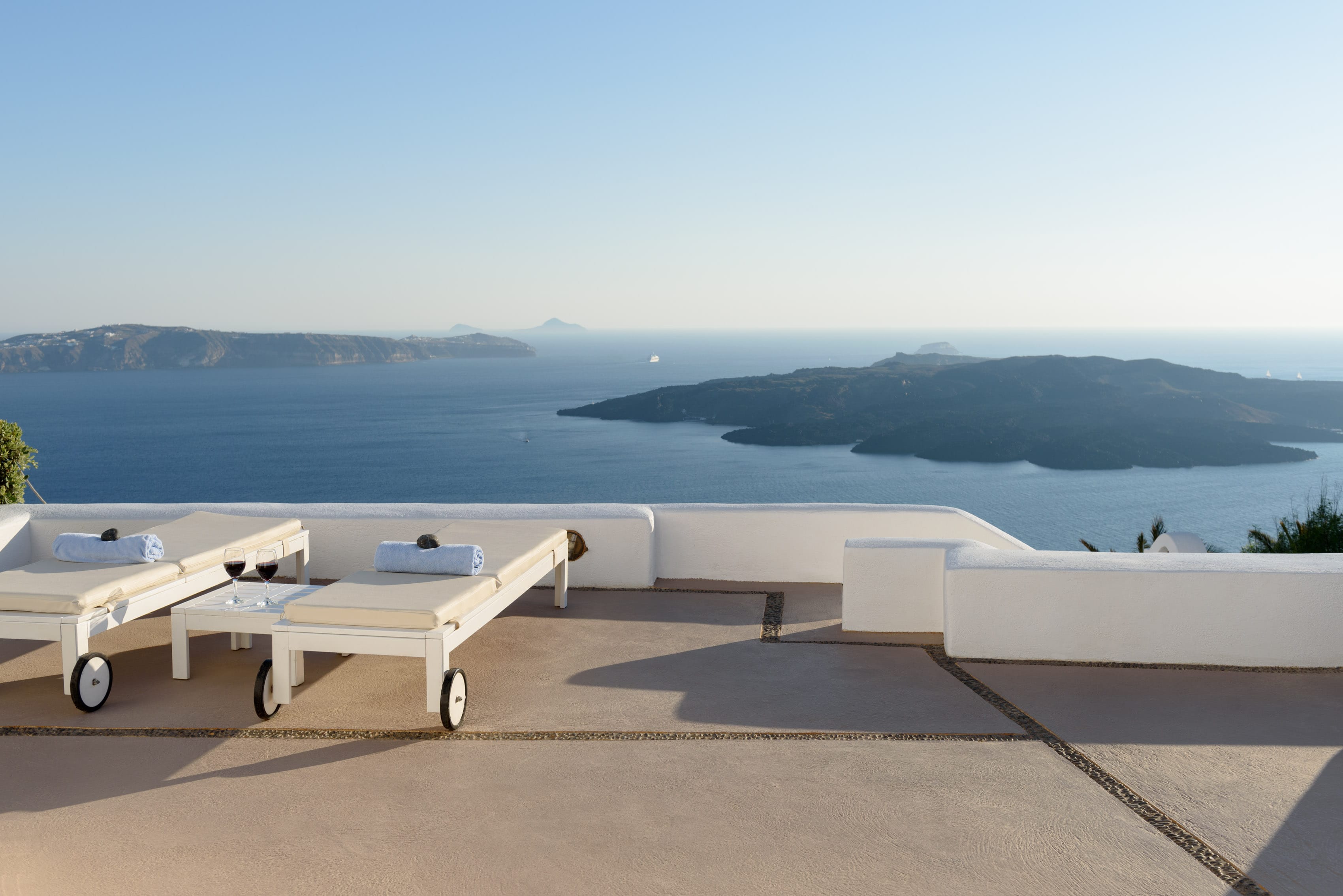 a deck with a view of the ocean