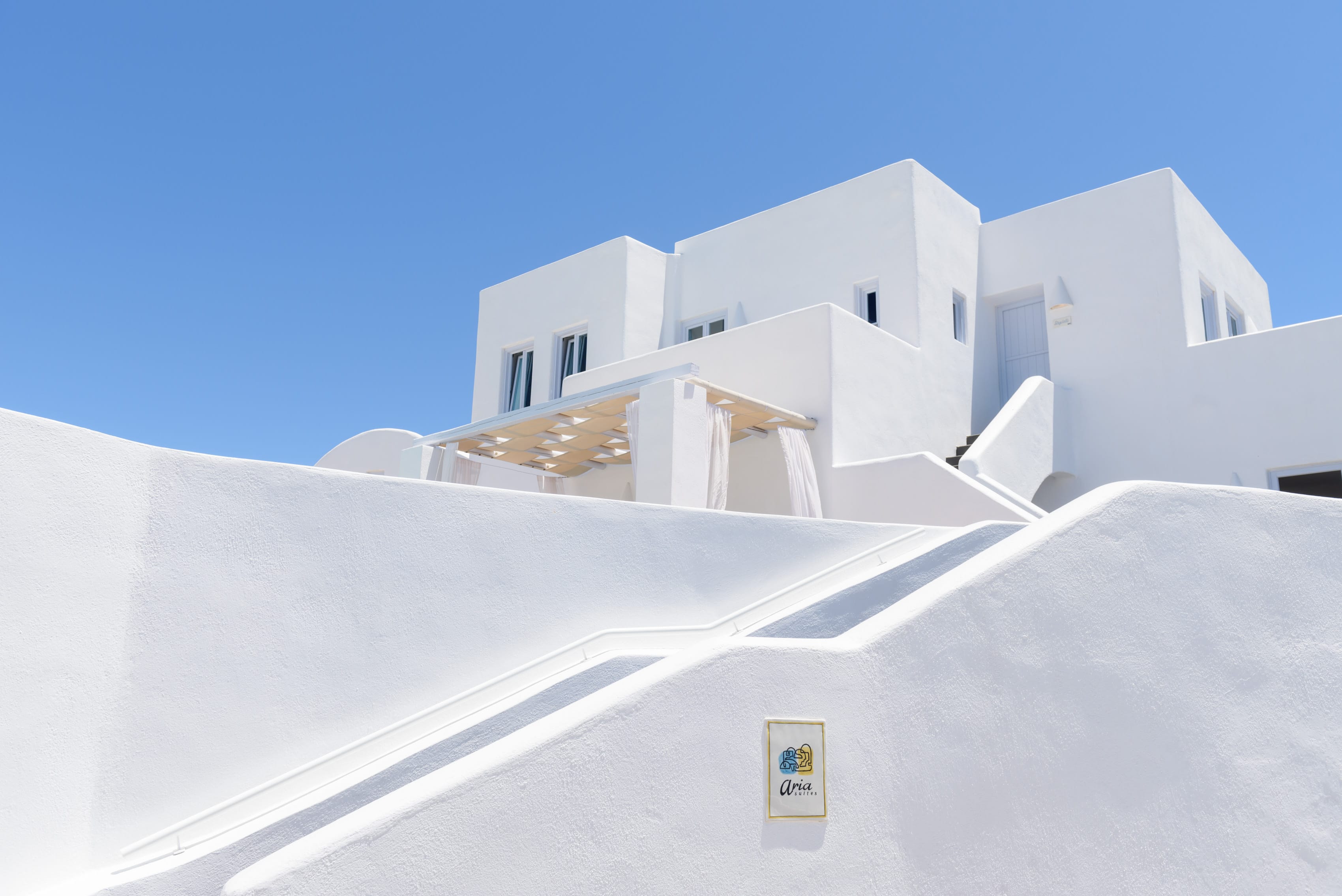 a white building with a staircase