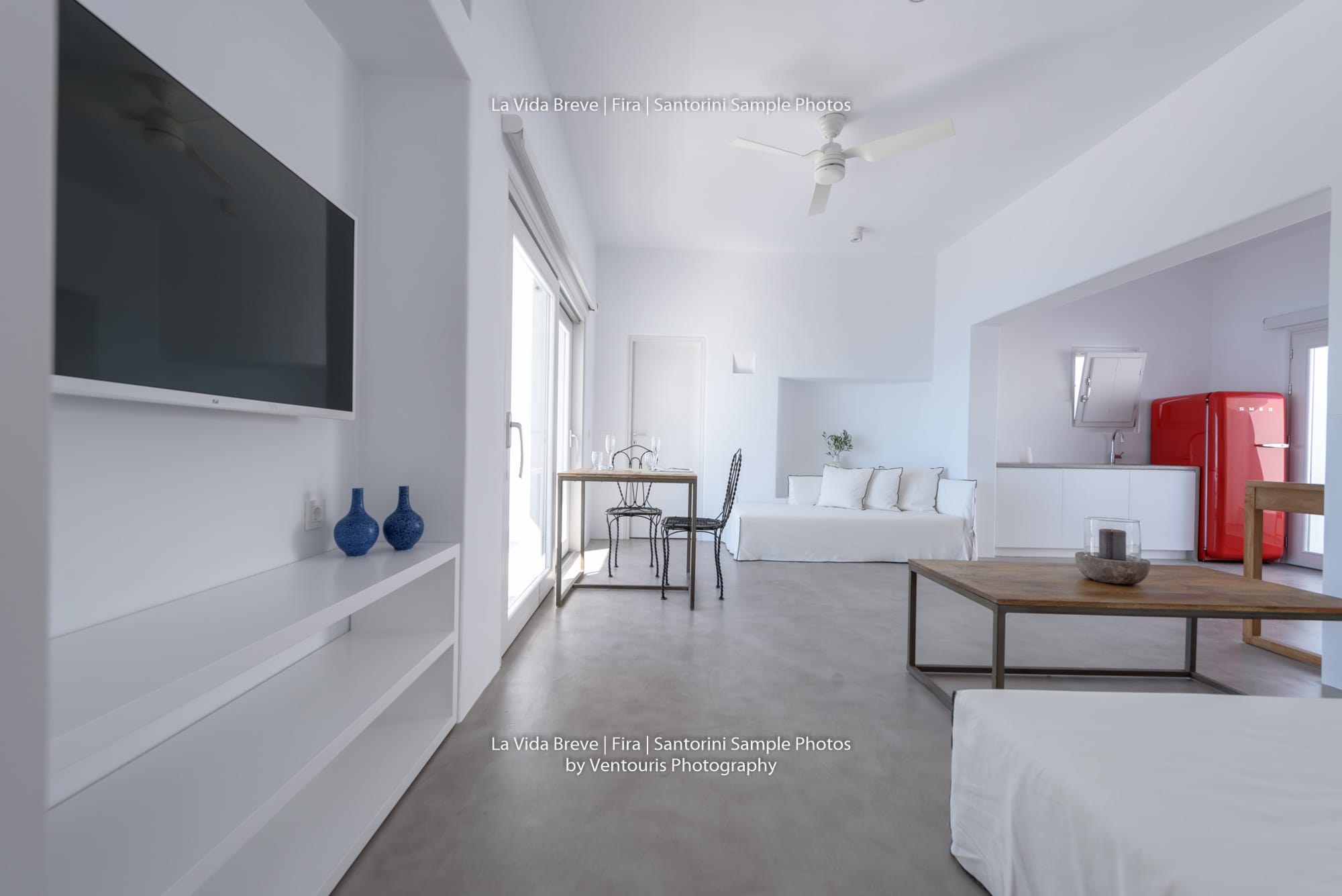 a room with a tv and a table
