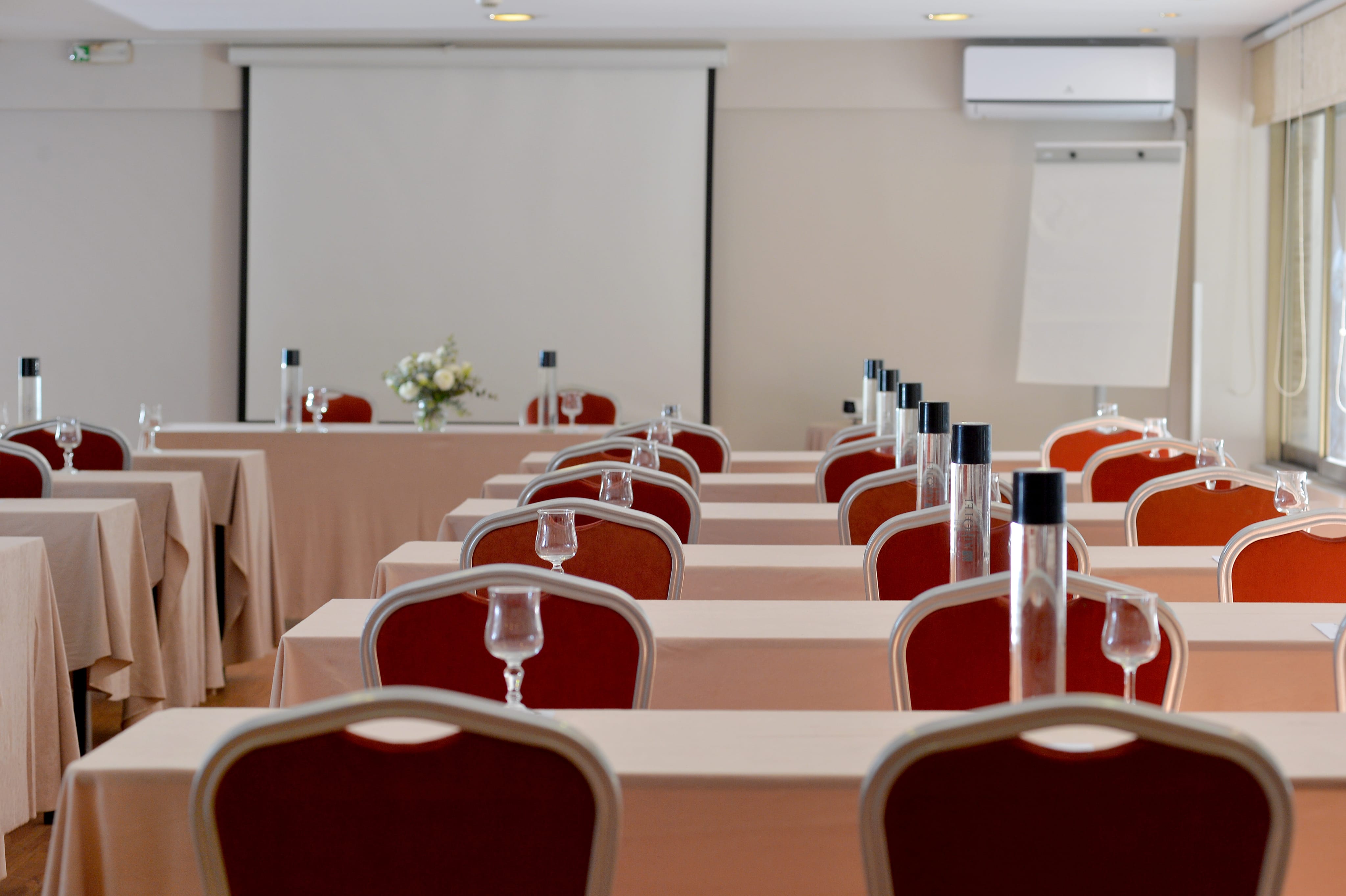 a room with tables and chairs