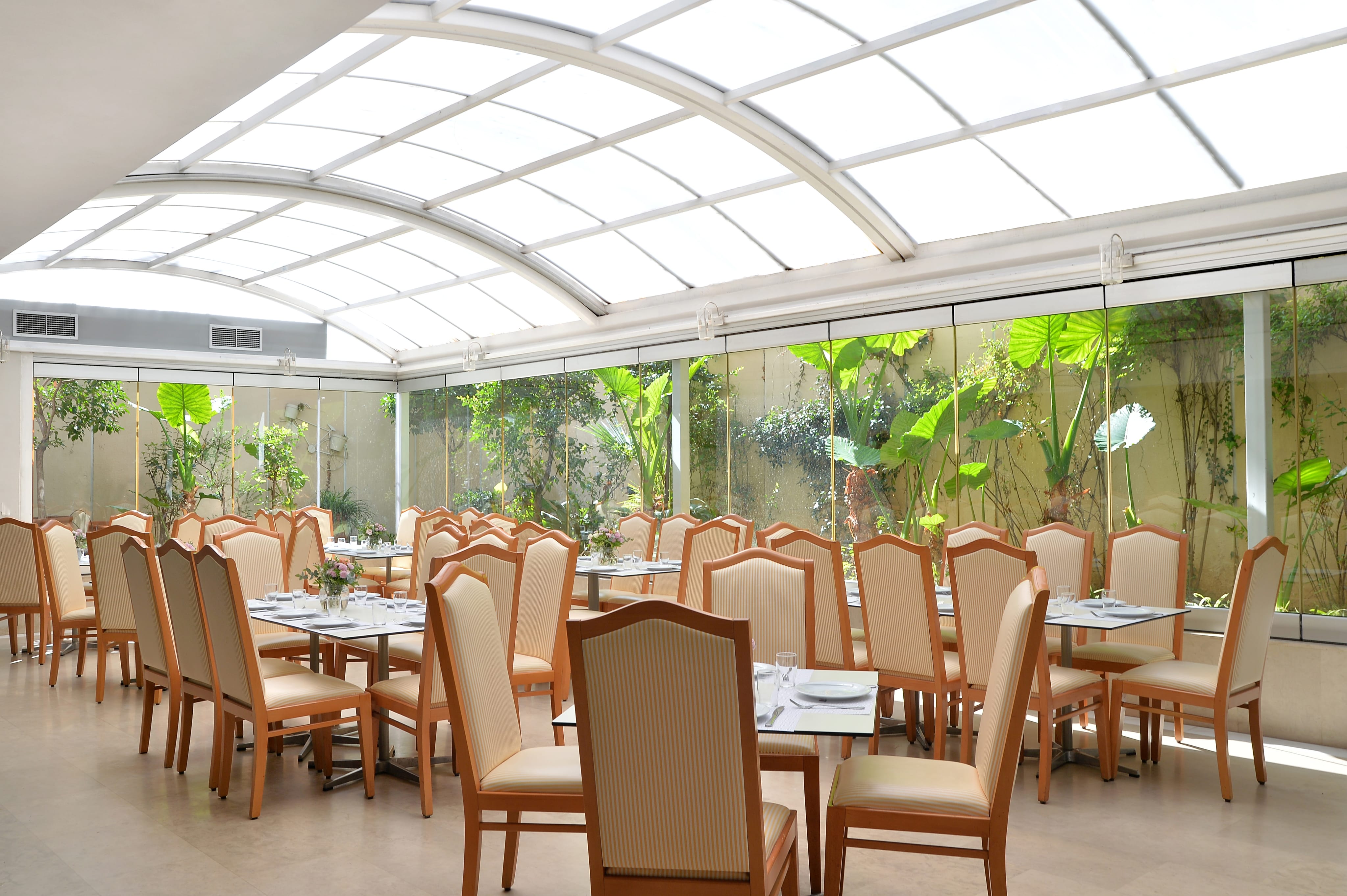a room with tables and chairs