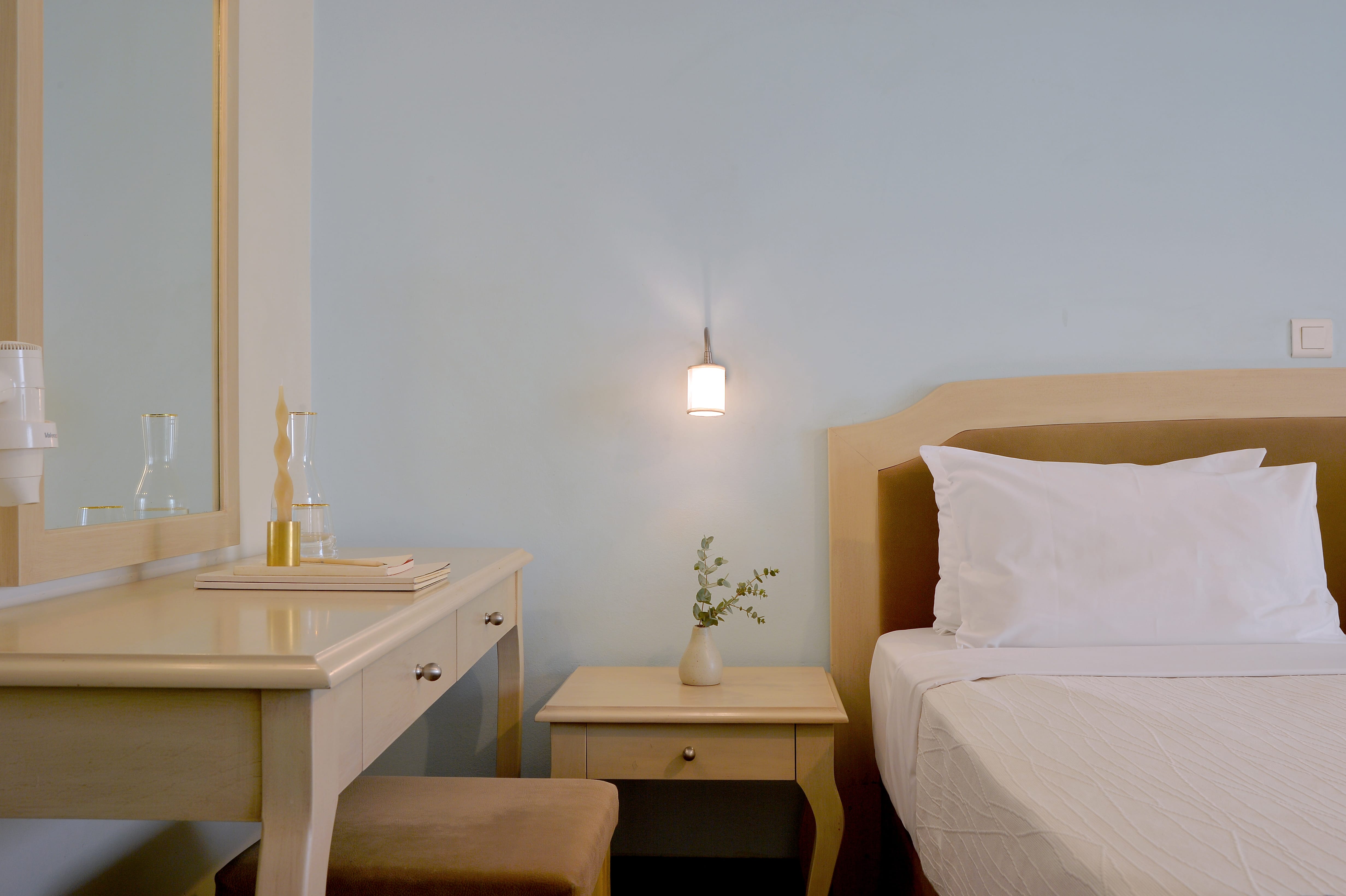 a bed and a table in a room