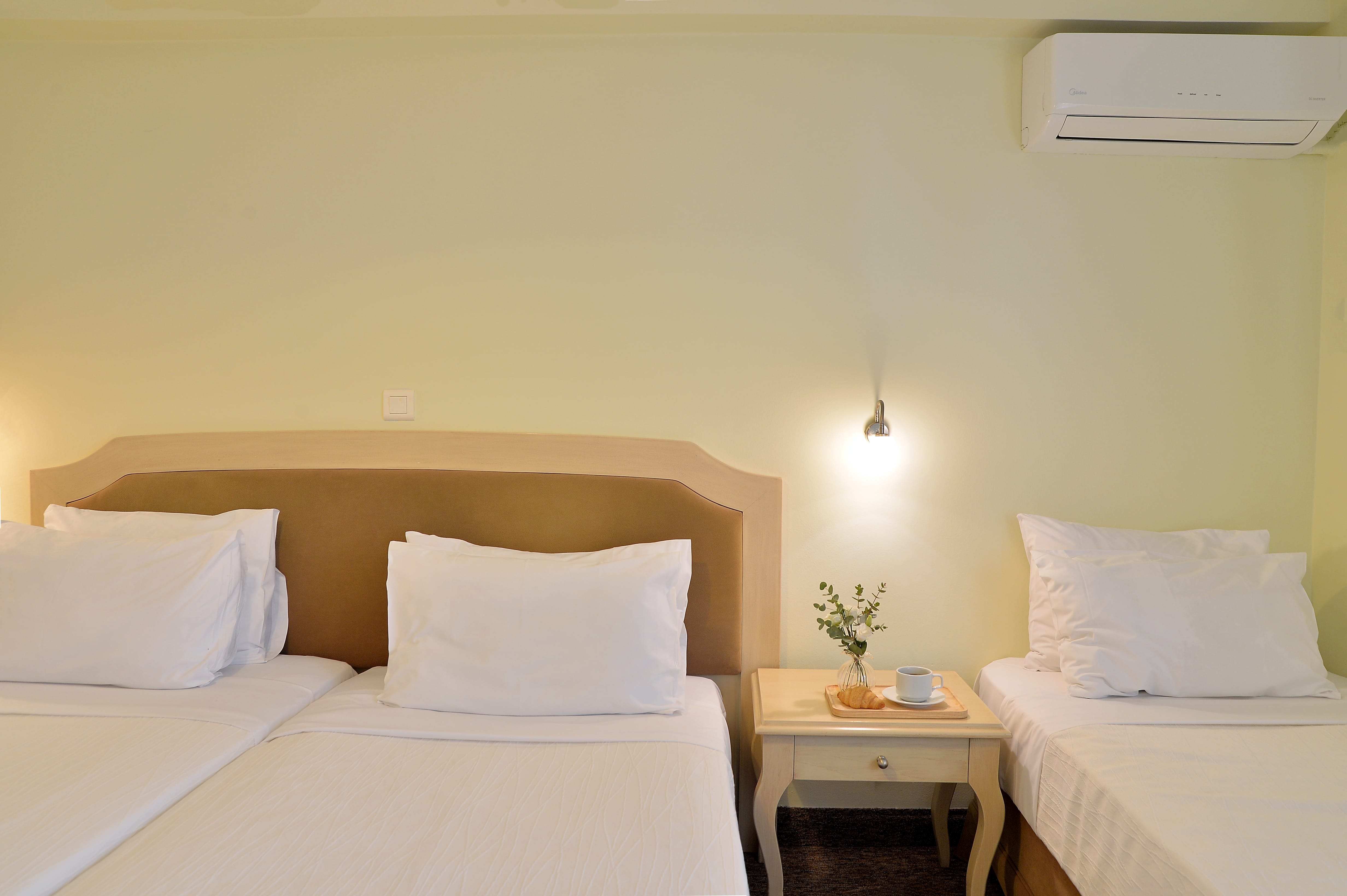a hotel room with two beds