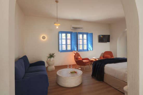 a room with a bed and a couch