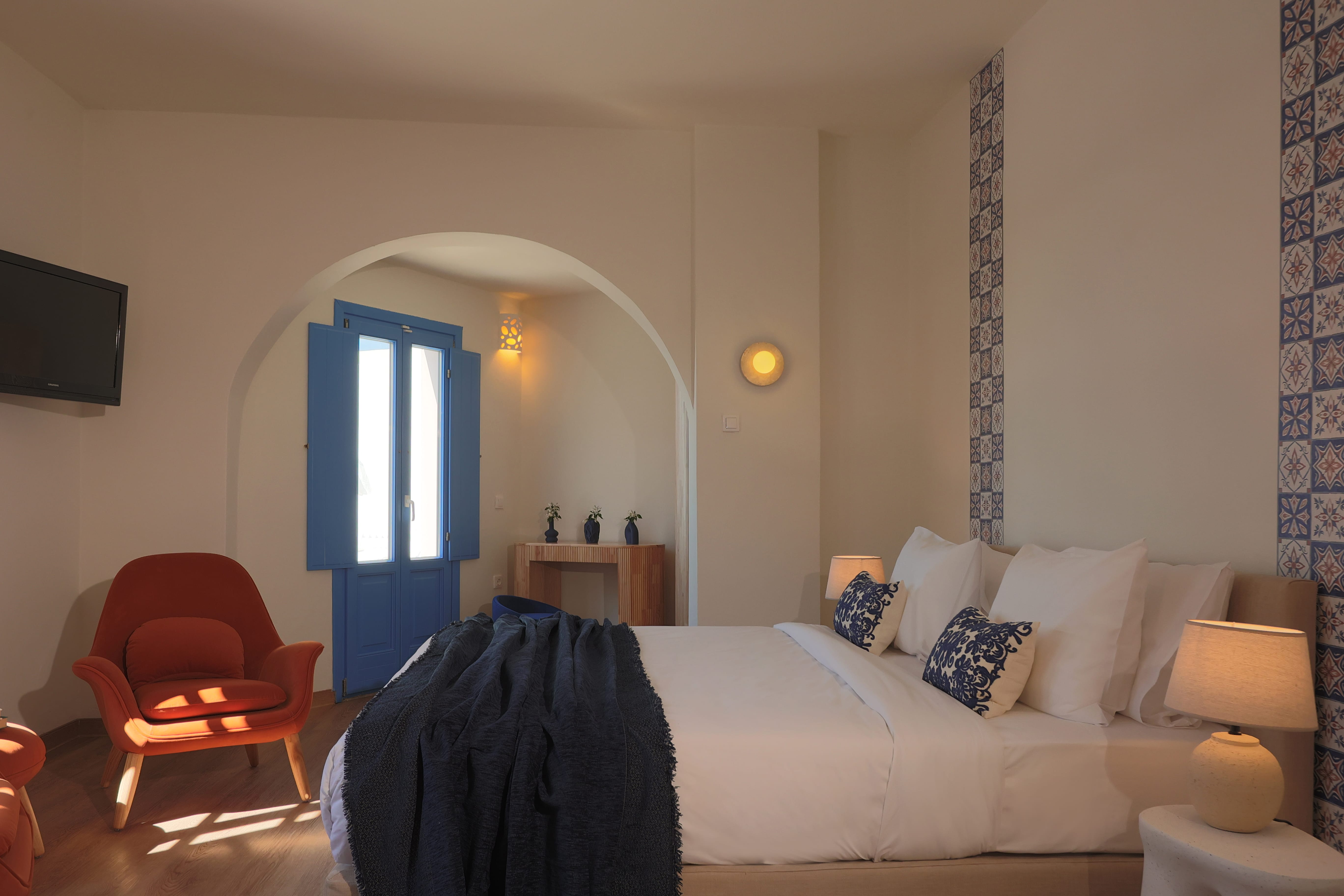 a bedroom with a blue door