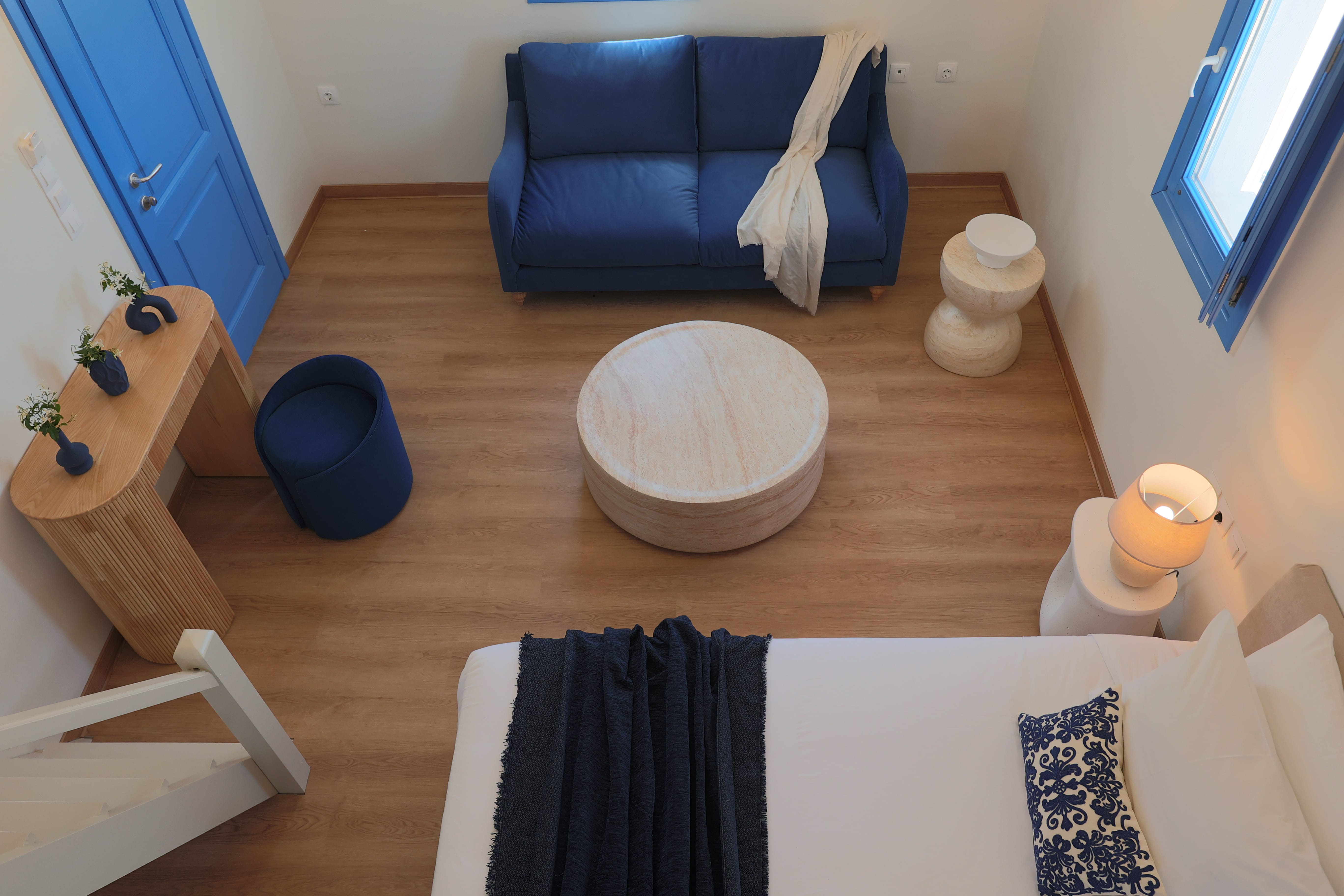 a room with a couch and a bed
