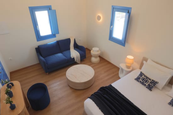 a room with a bed and a couch