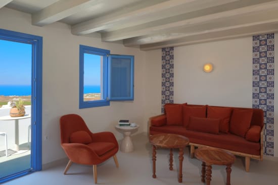 a living room with a couch and a table