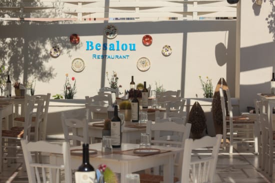 a restaurant with tables and chairs