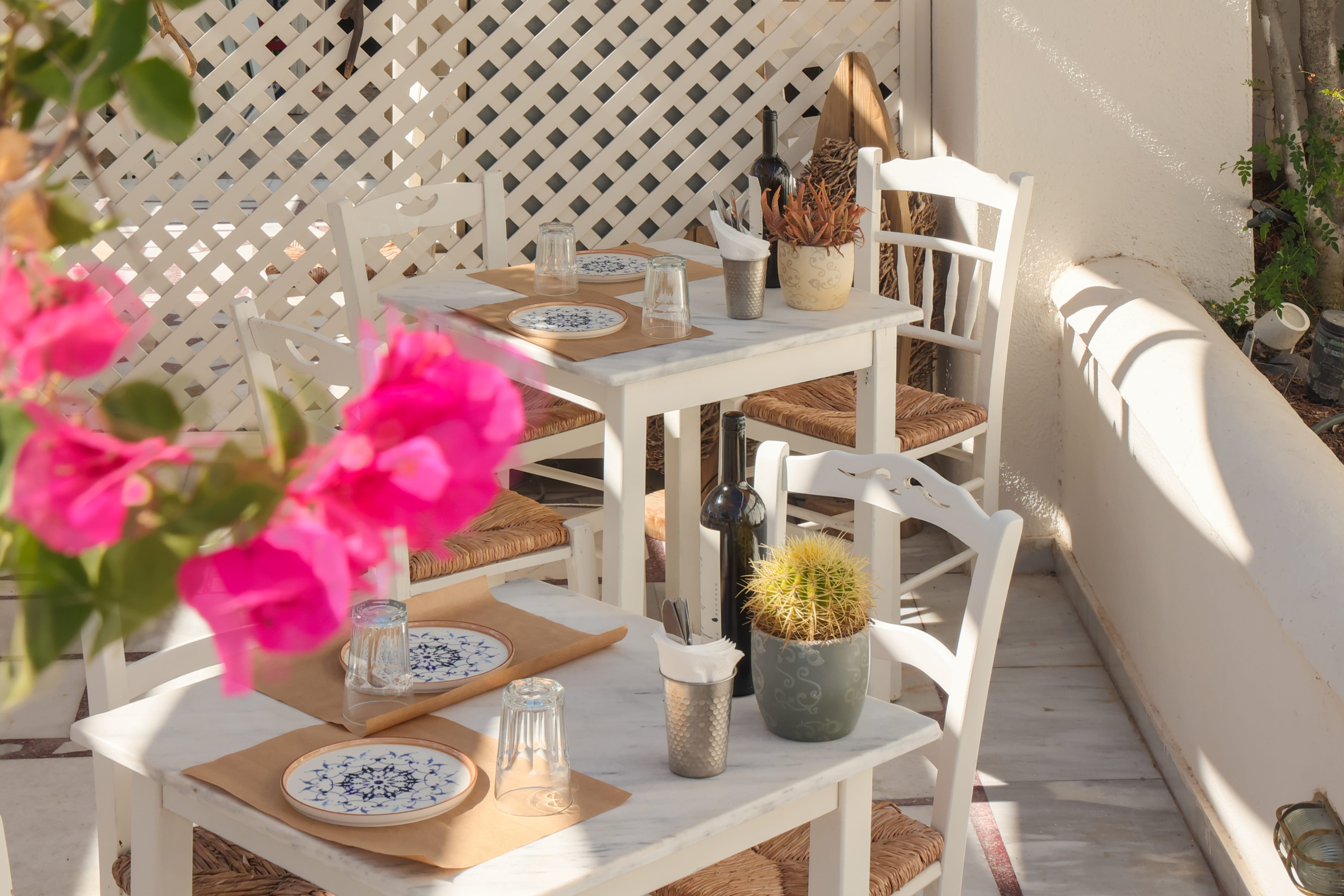 a table and chairs on a patio