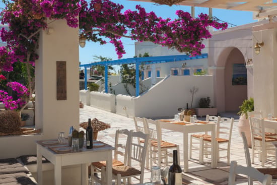 a restaurant with tables and chairs
