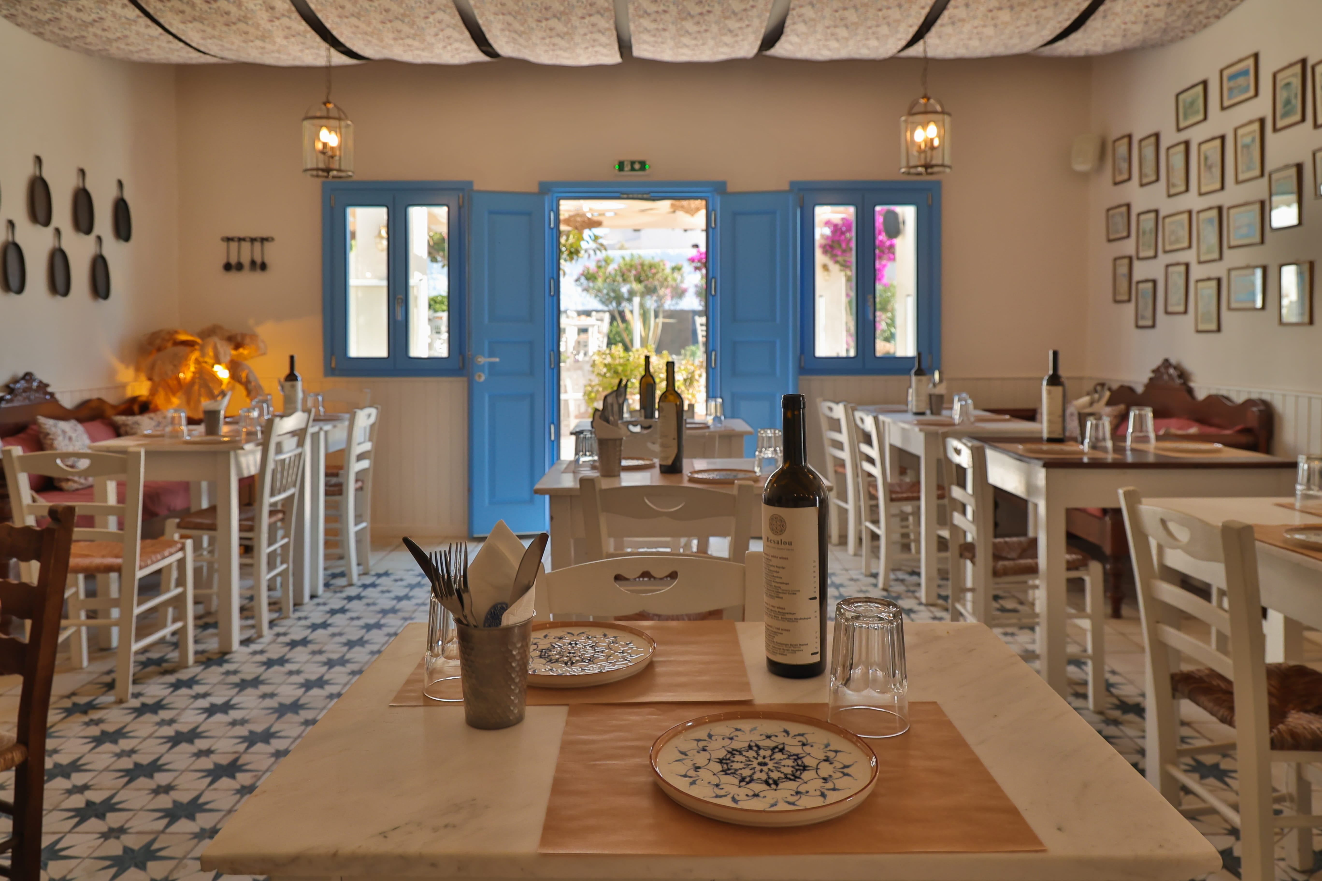 a restaurant with blue doors