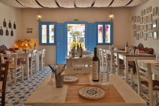 a restaurant with blue doors