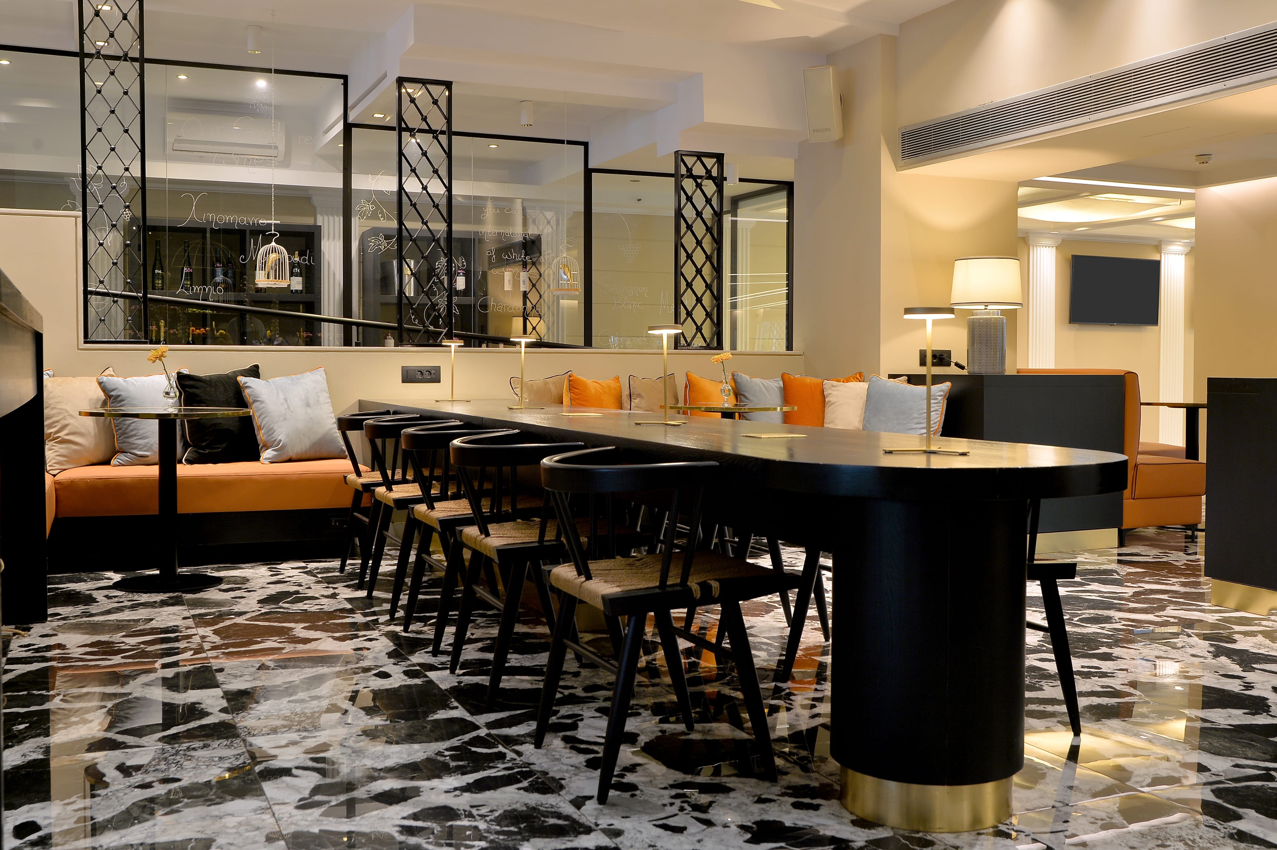 a long table with chairs in a room