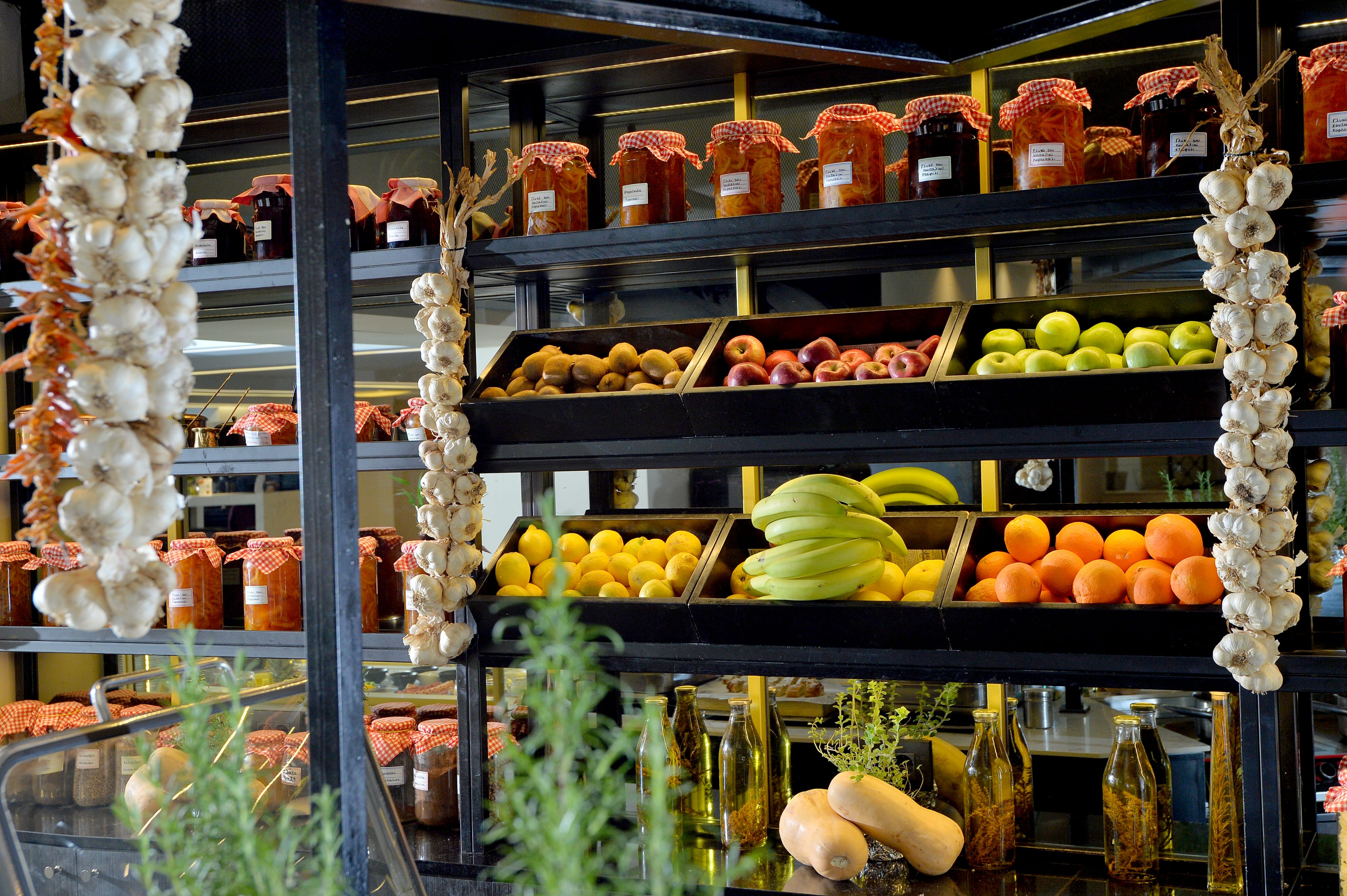 shelves of fruits and vegetables on shelves