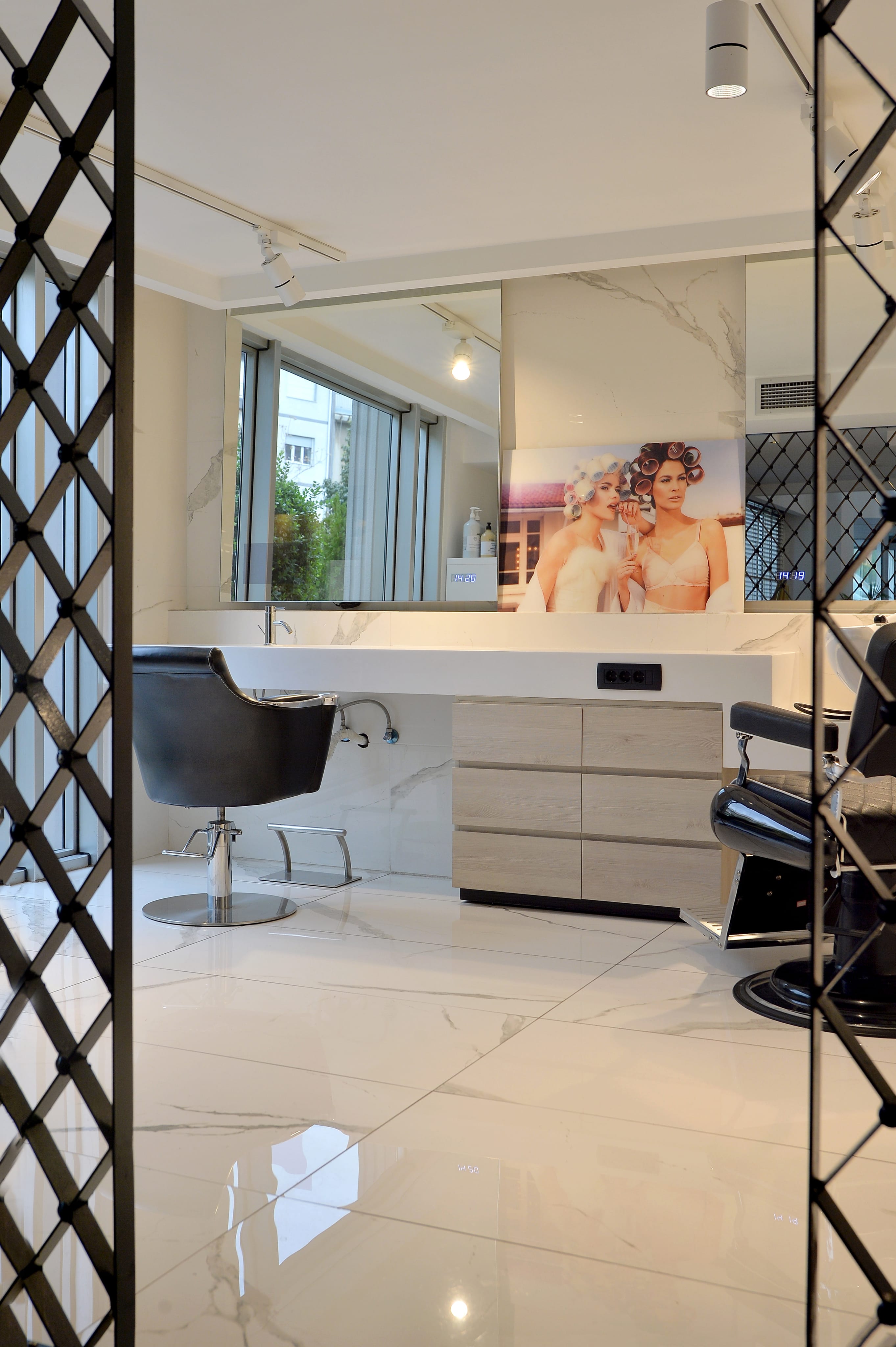 a room with a mirror and a chair