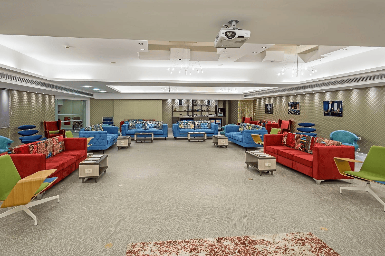 a room with couches and tables