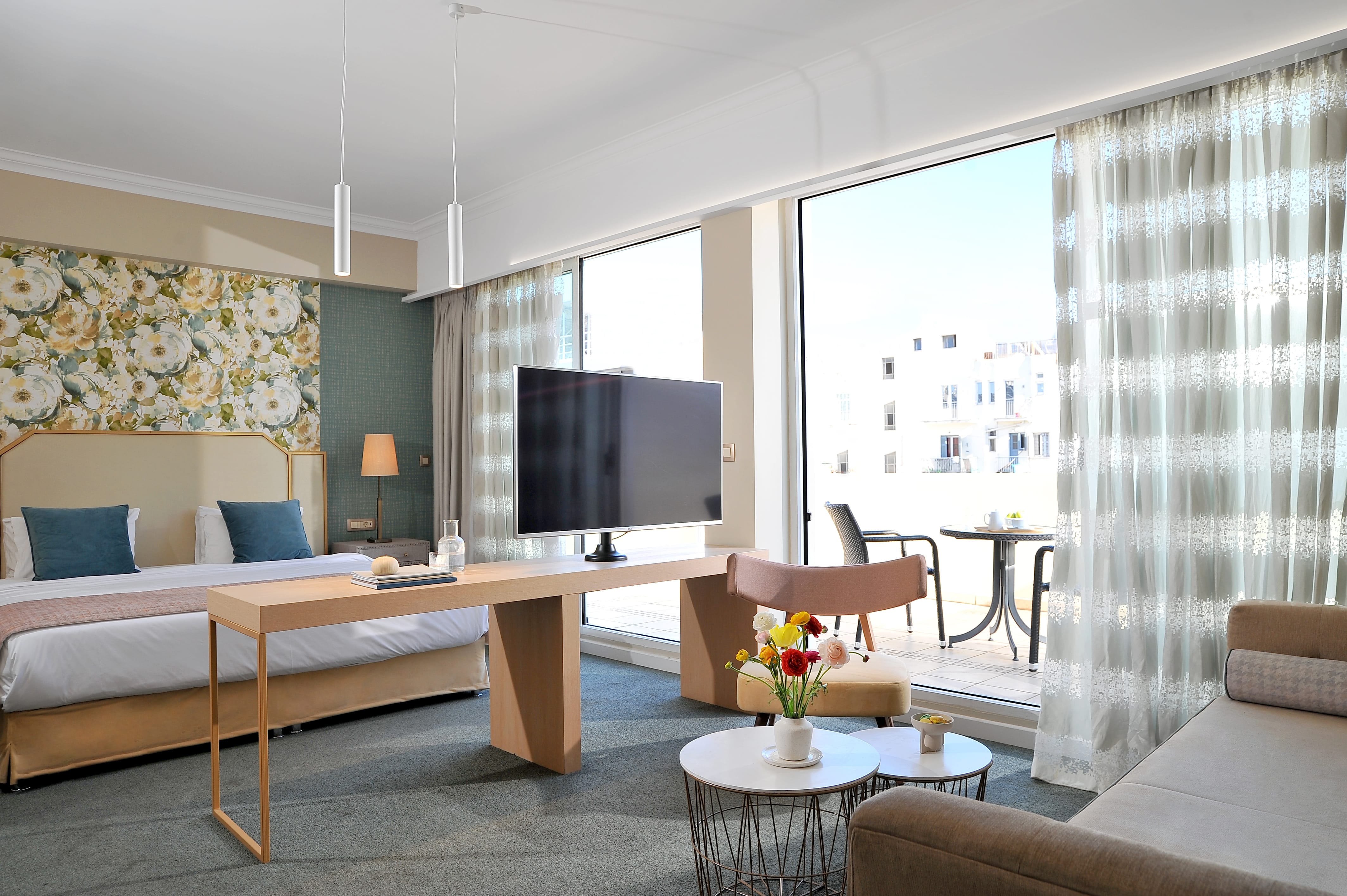 a room with a television and a table