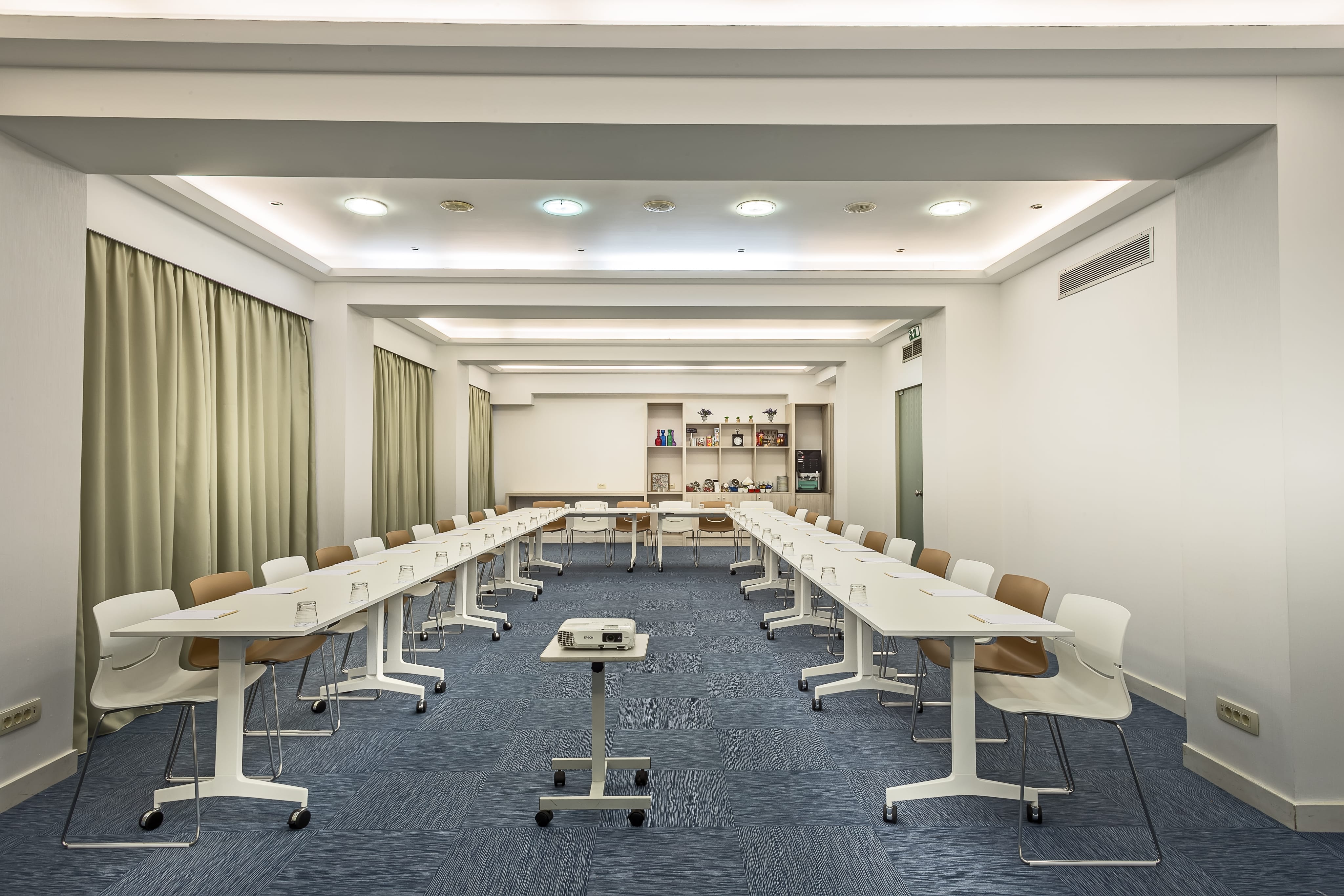 a room with tables and chairs