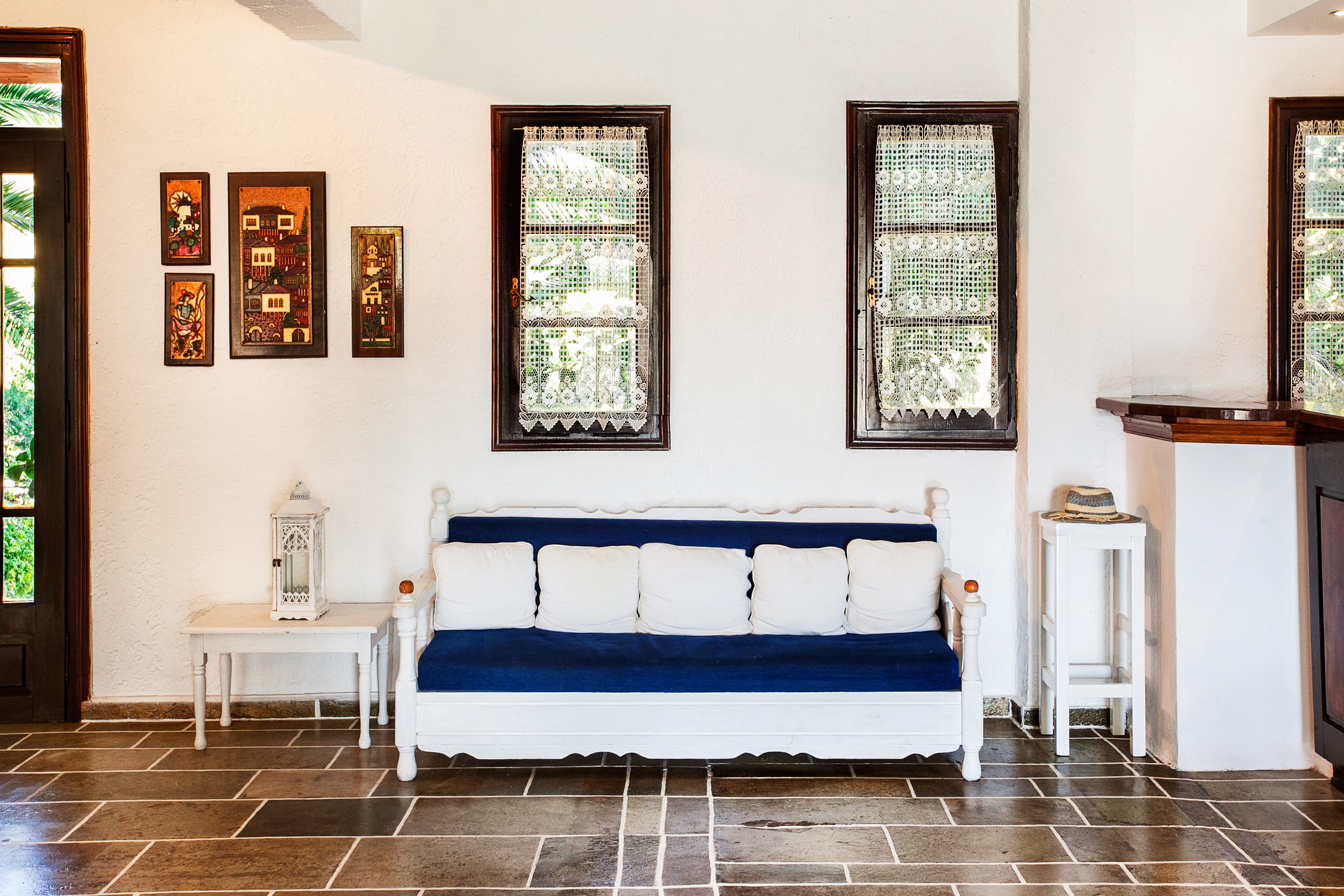 a white and blue couch in a room