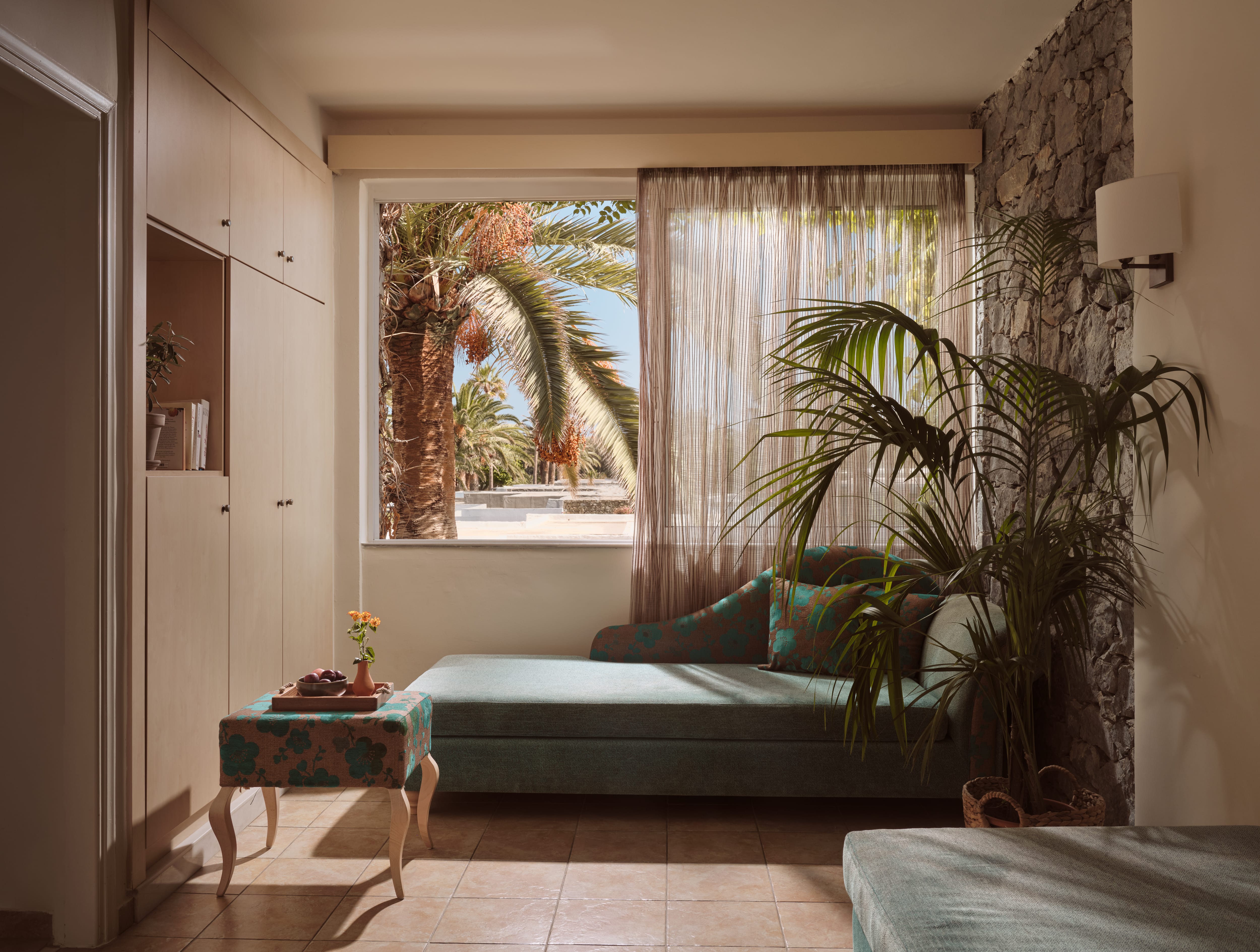 a room with a couch and a window
