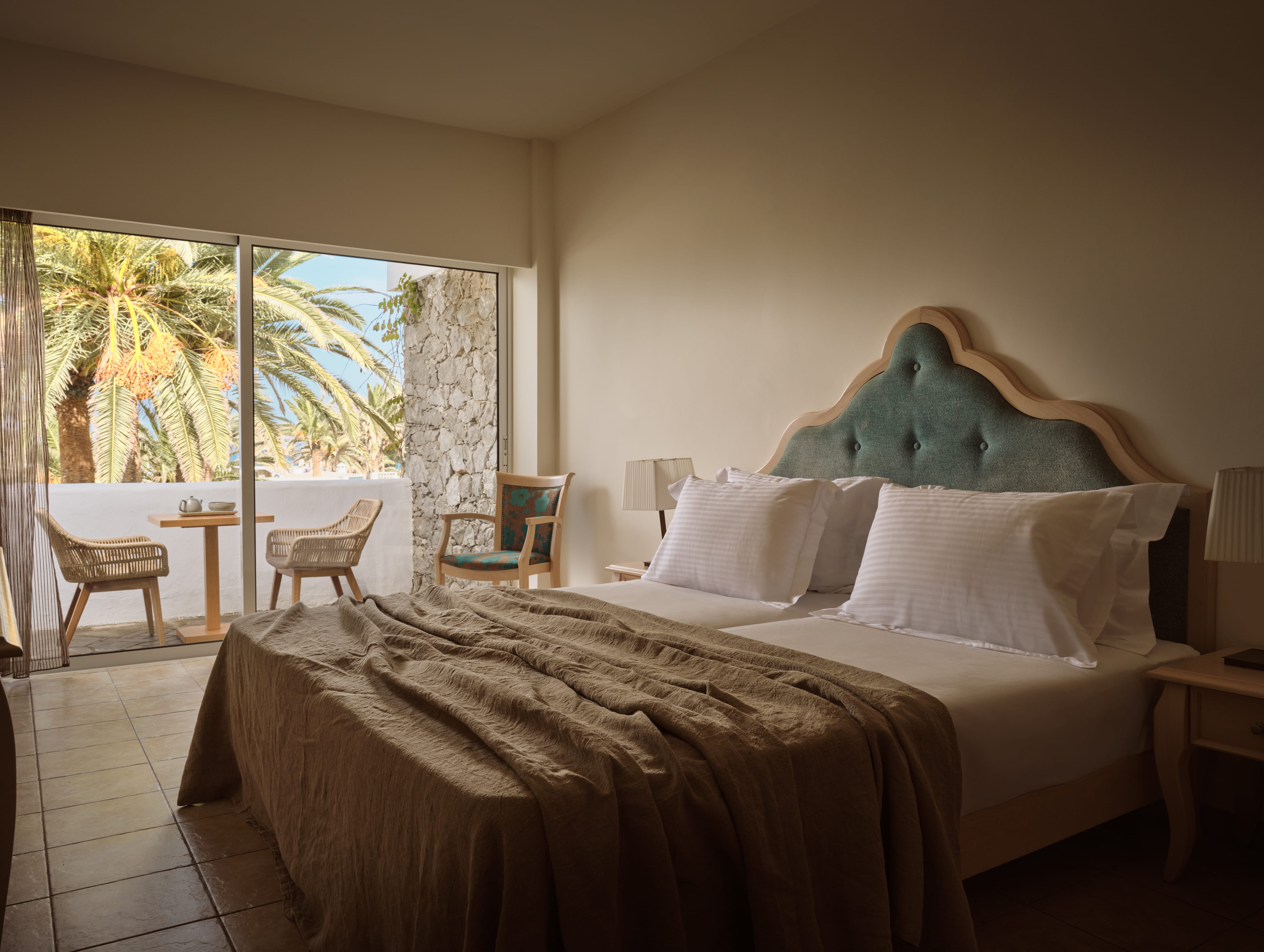 a bed with a glass door