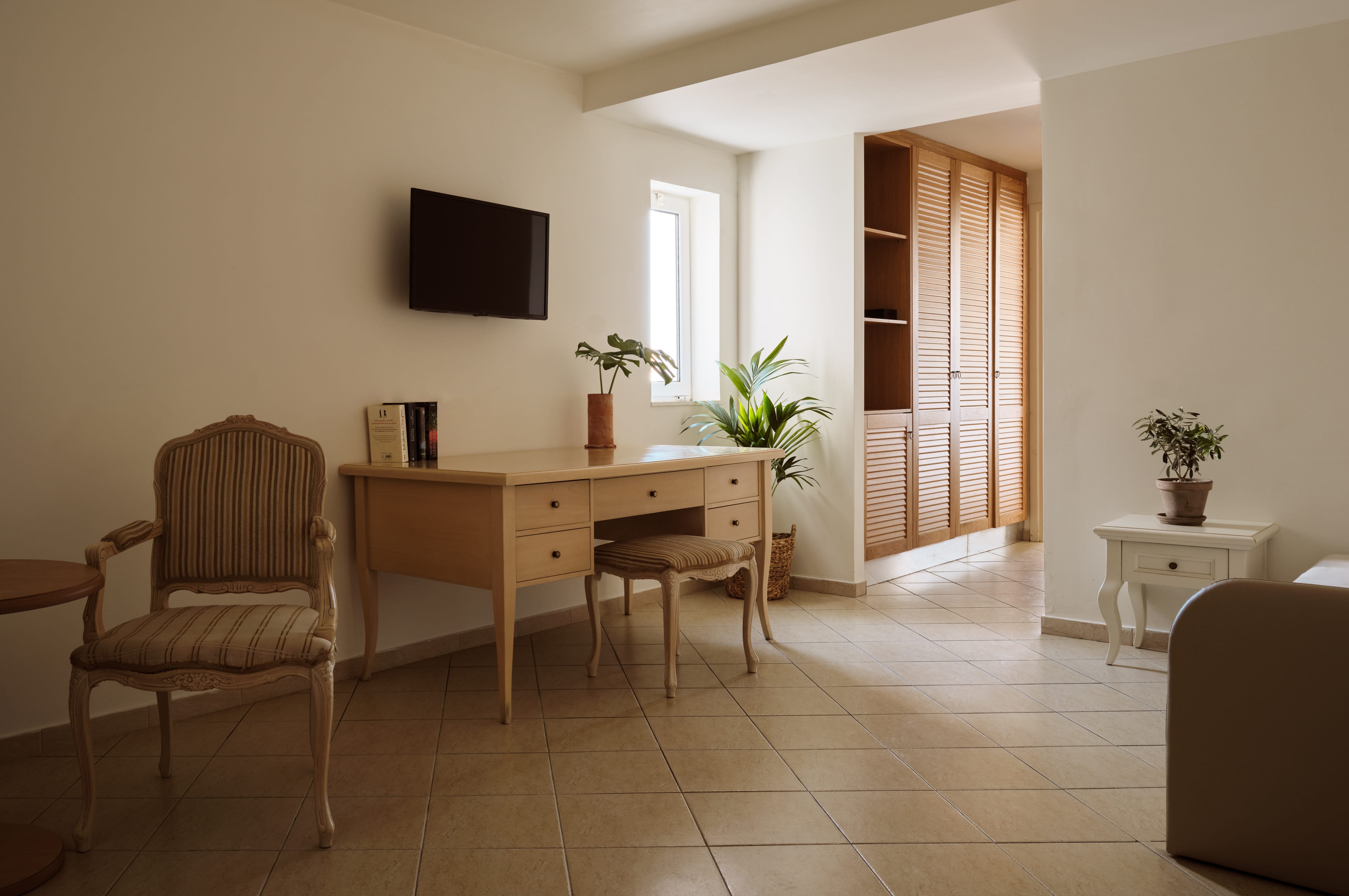 a room with a desk and chair
