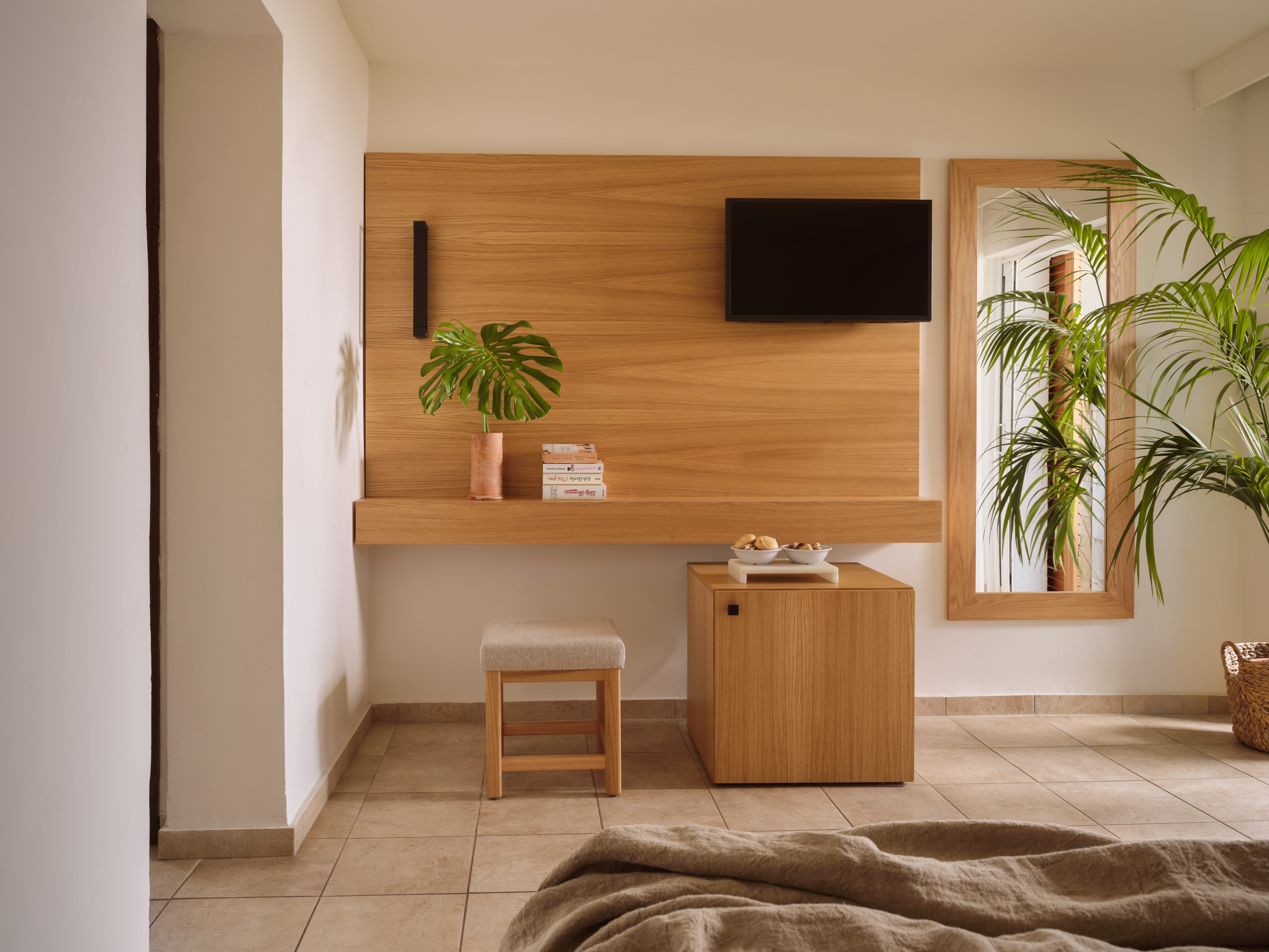 a room with a tv and a table