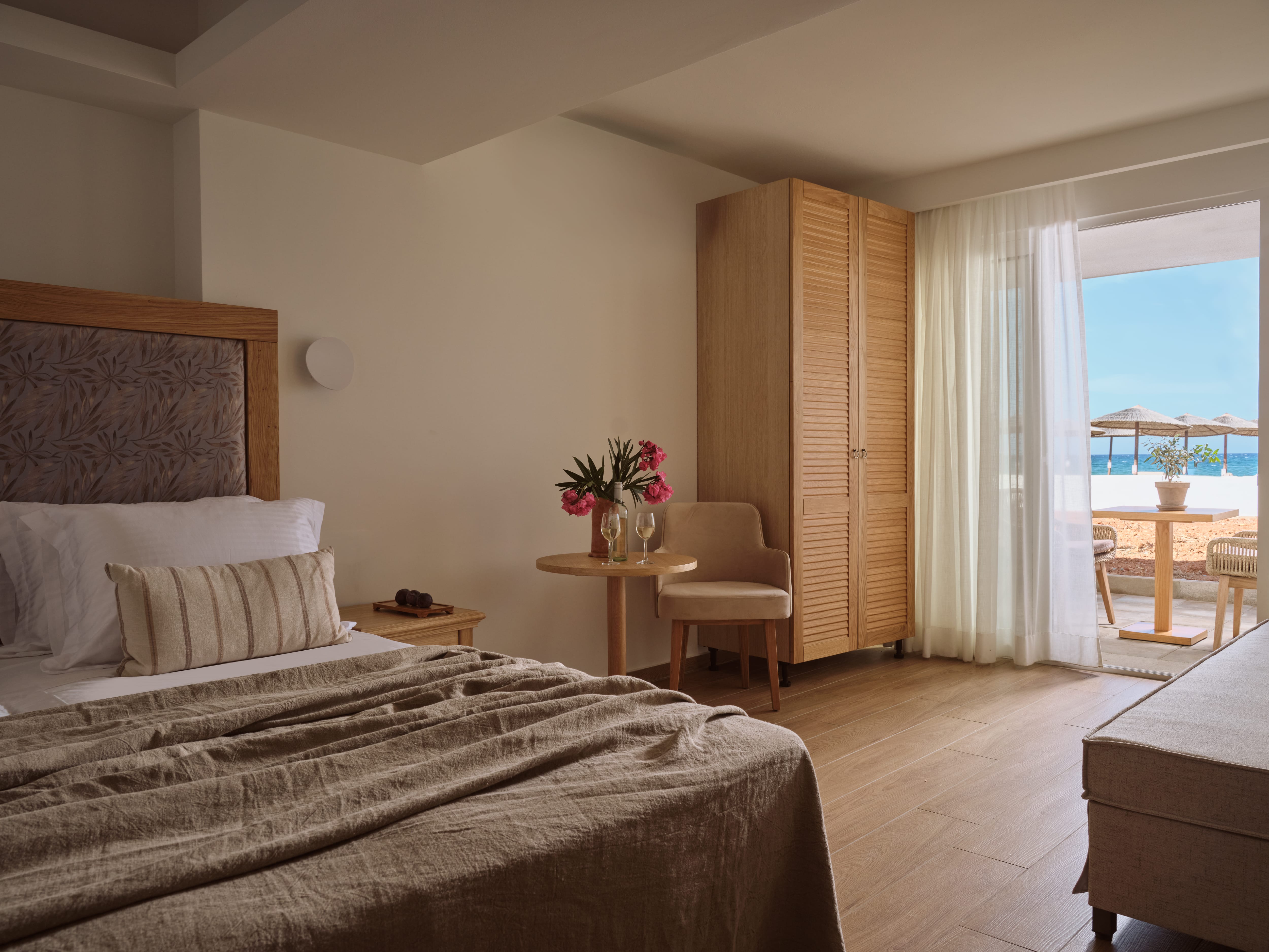 a room with a bed and a chair