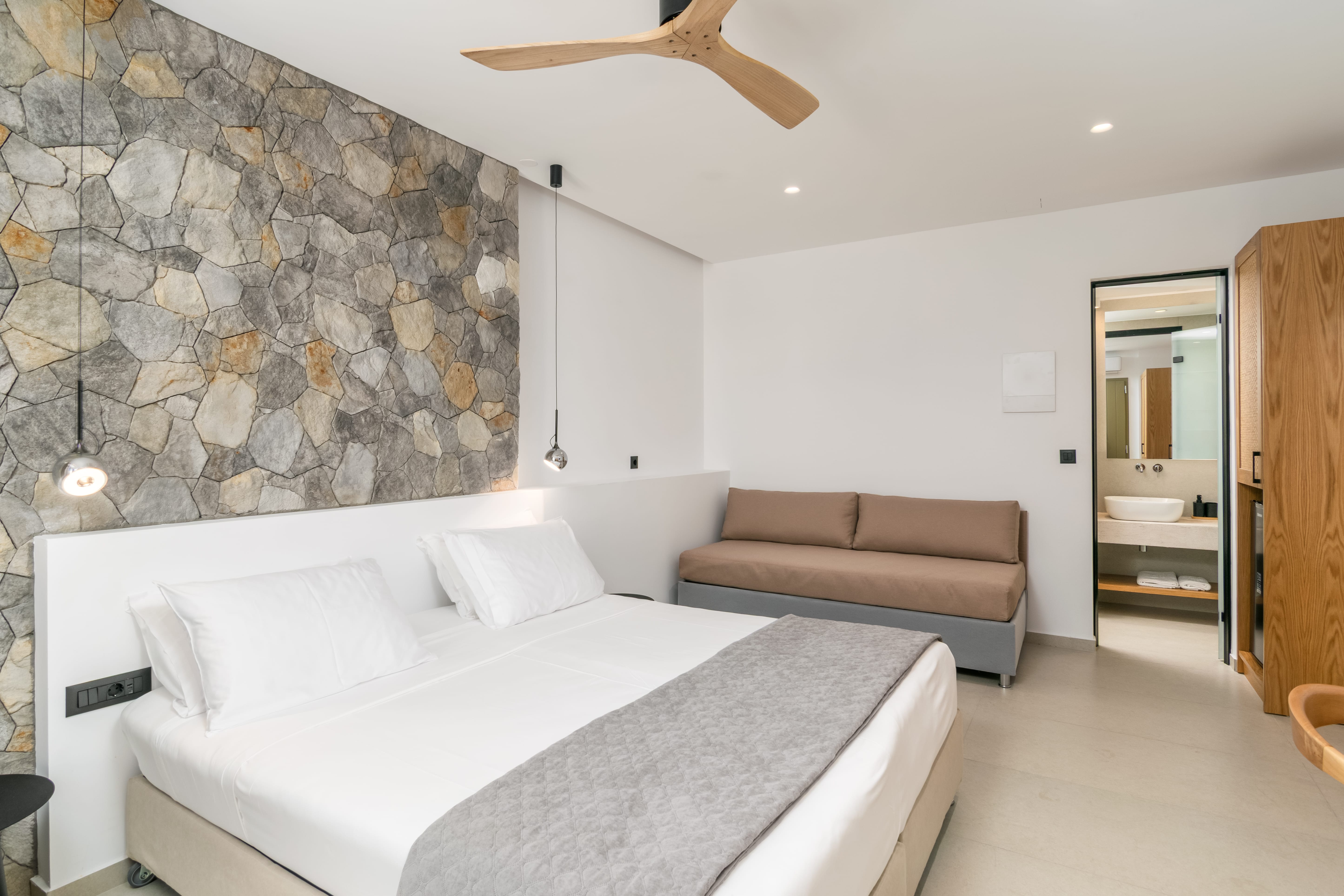 a room with a bed and a couch