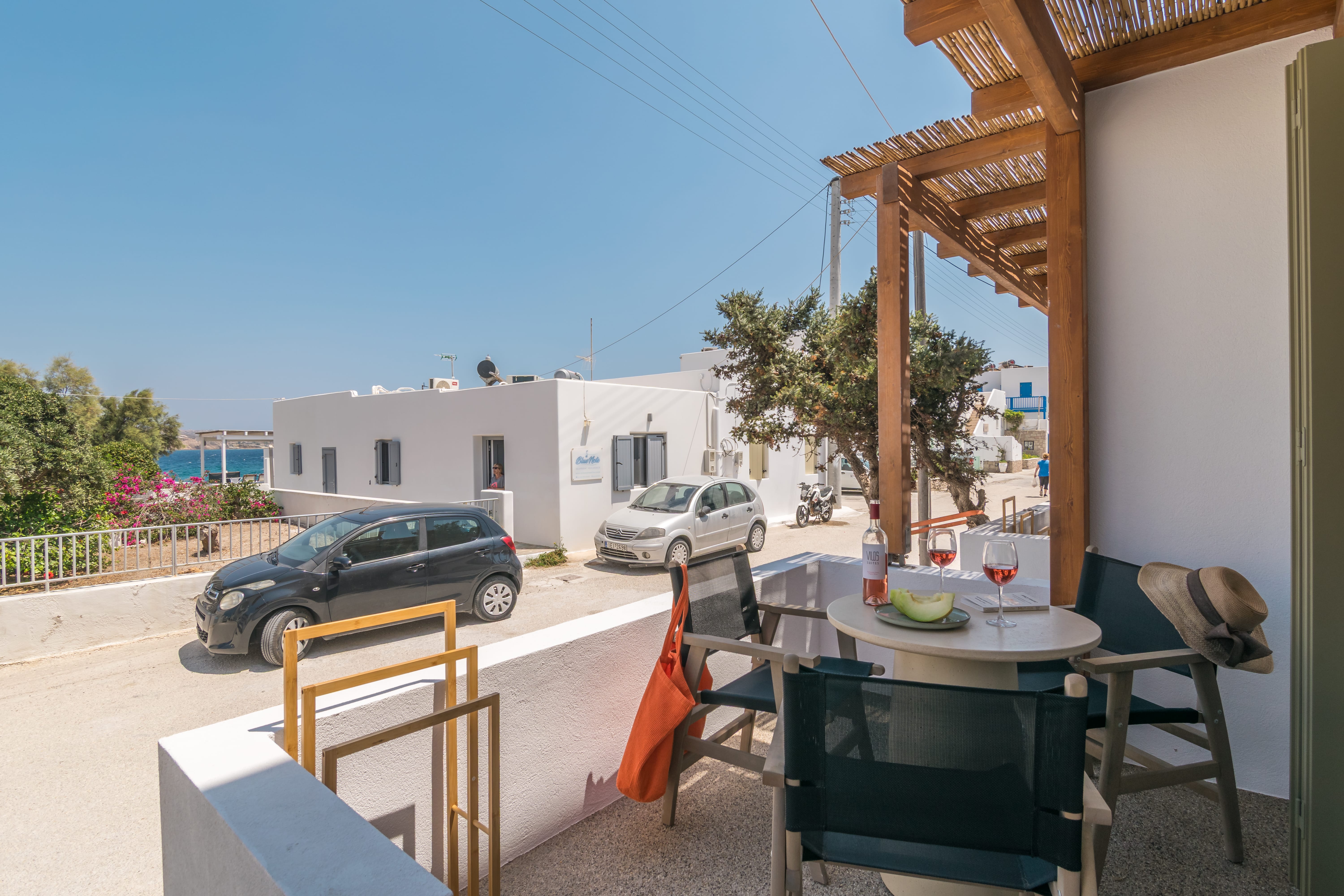 a table and chairs on a balcony