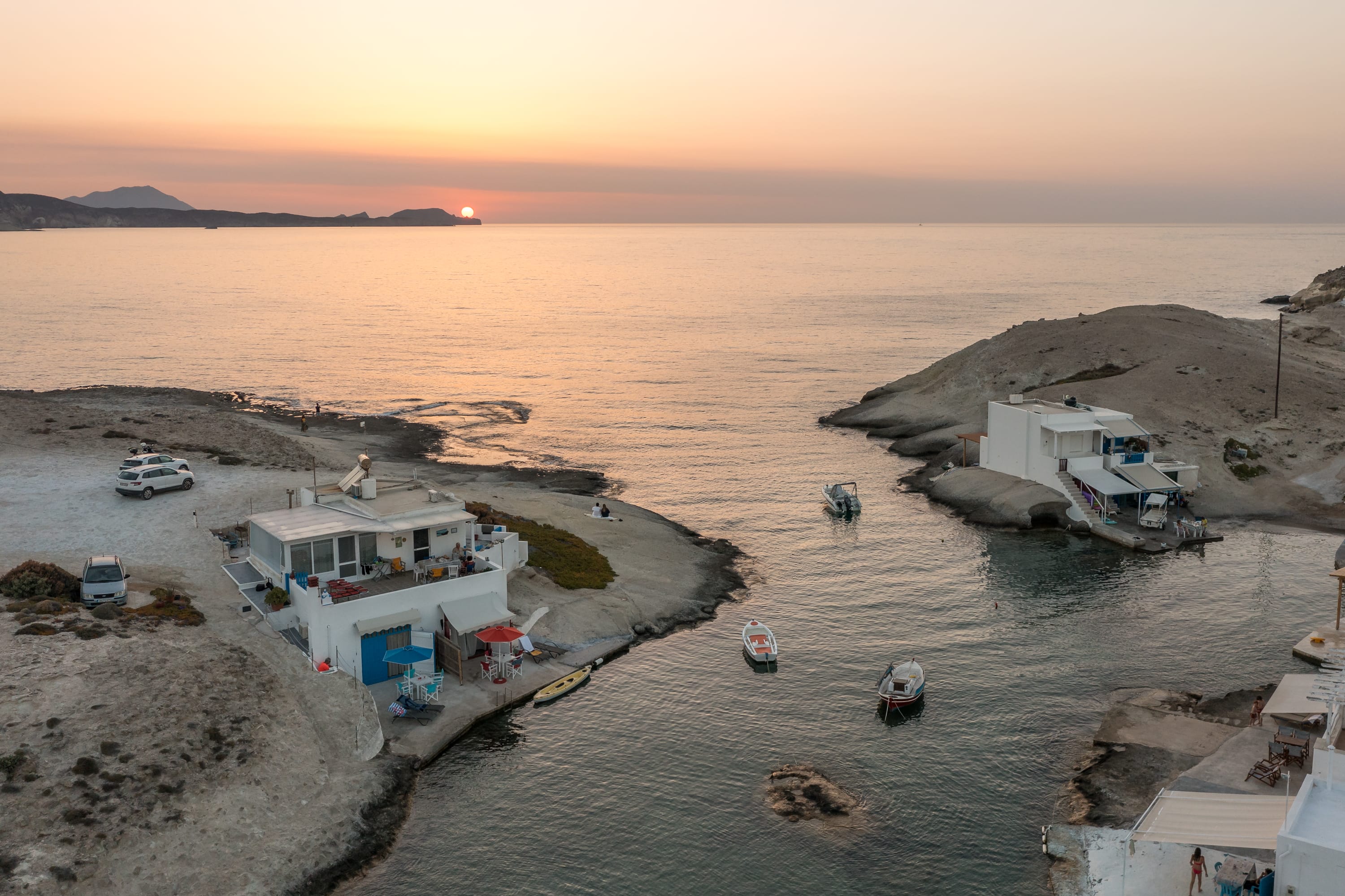 a group of houses on a beach