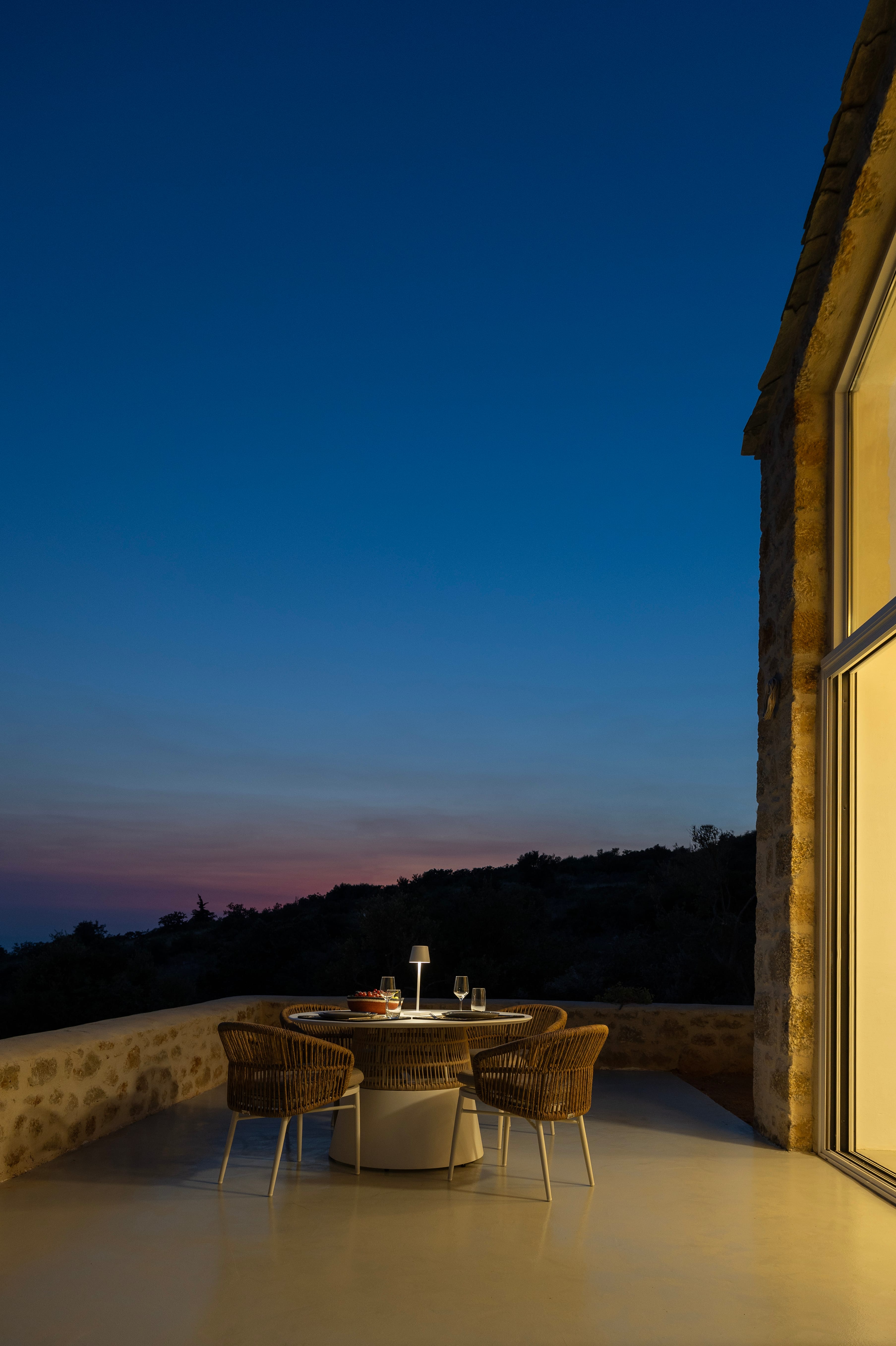 a table and chairs on a patio