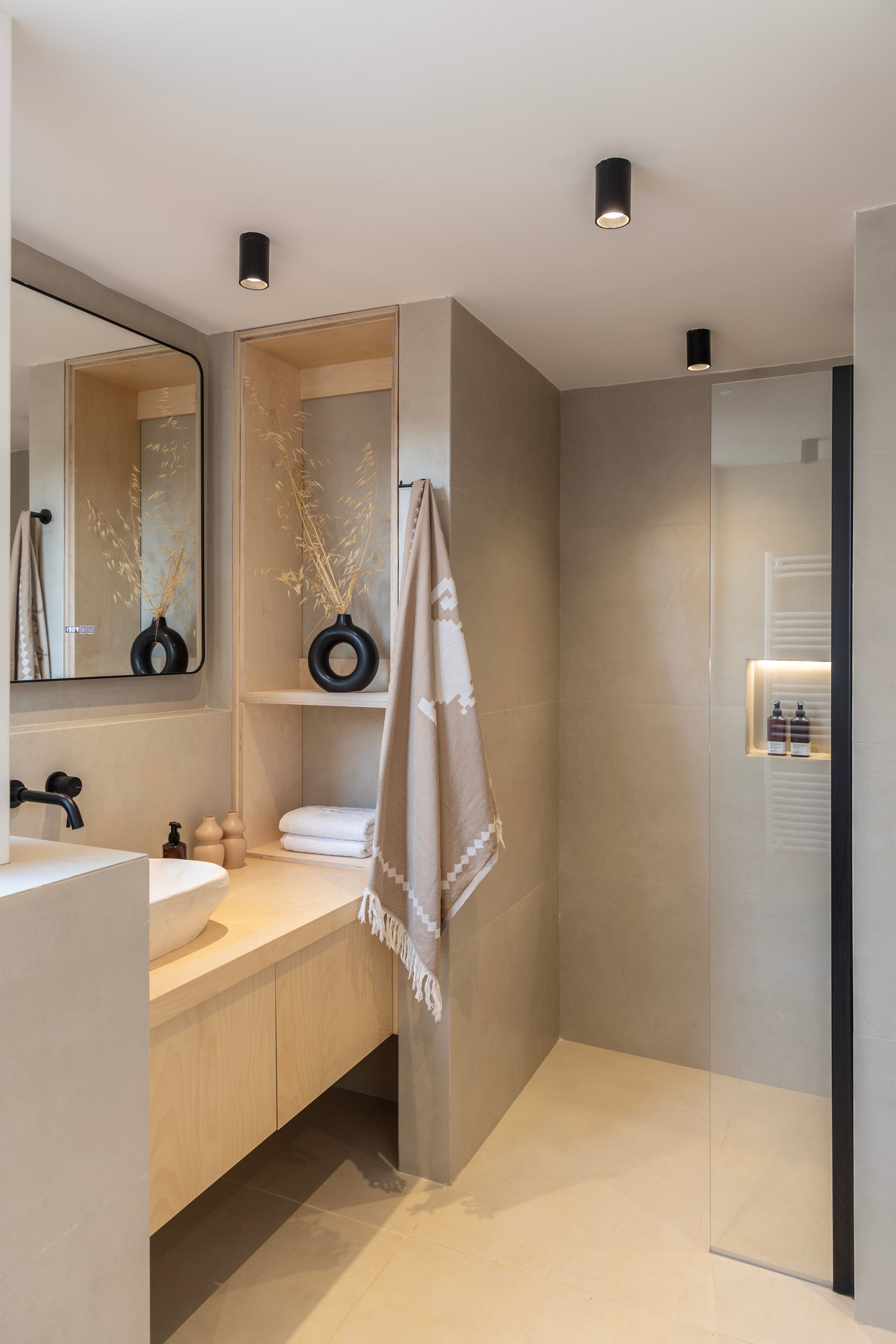 a bathroom with a sink and mirror