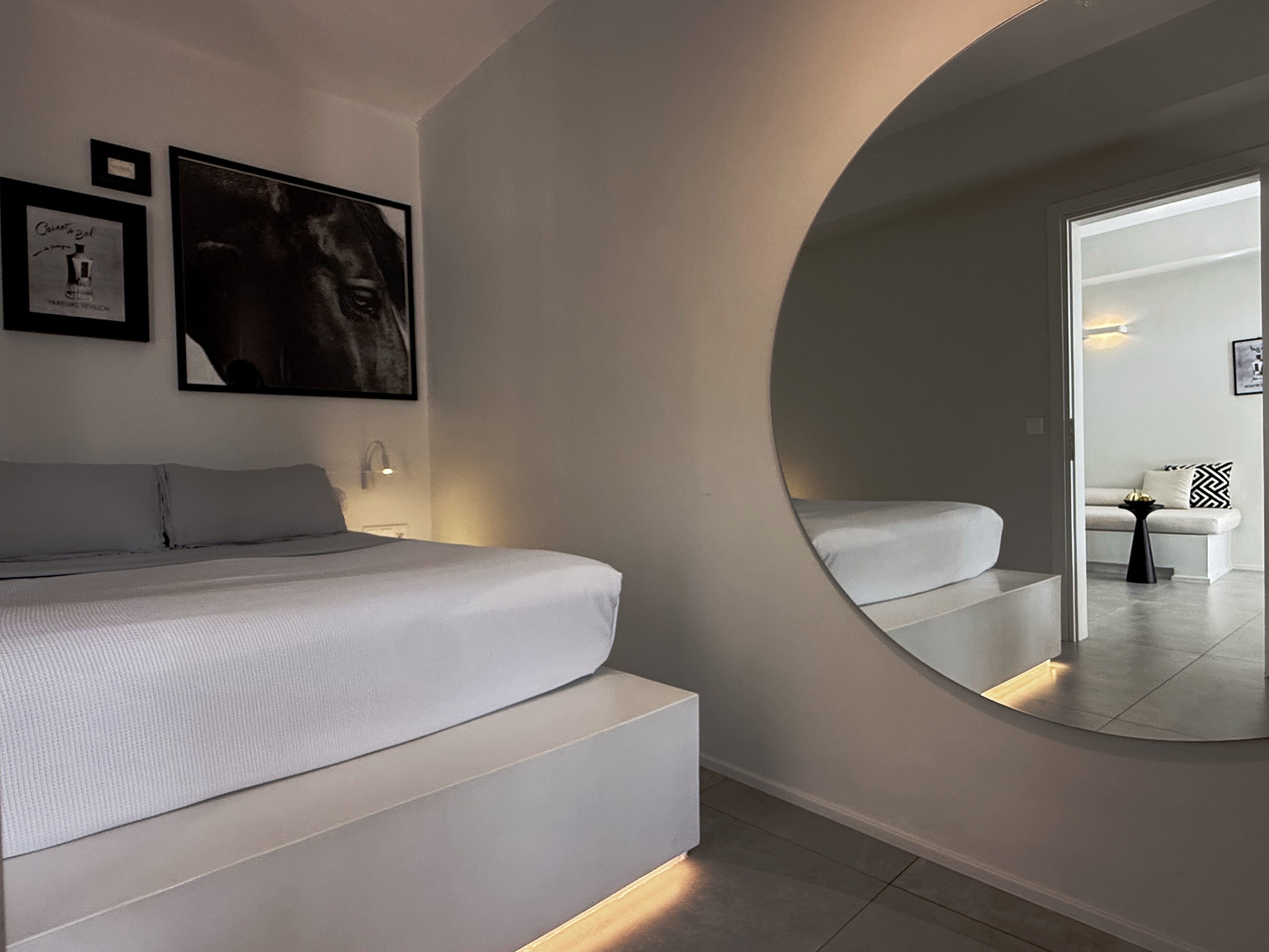 a modern looking bathroom with a large mirror