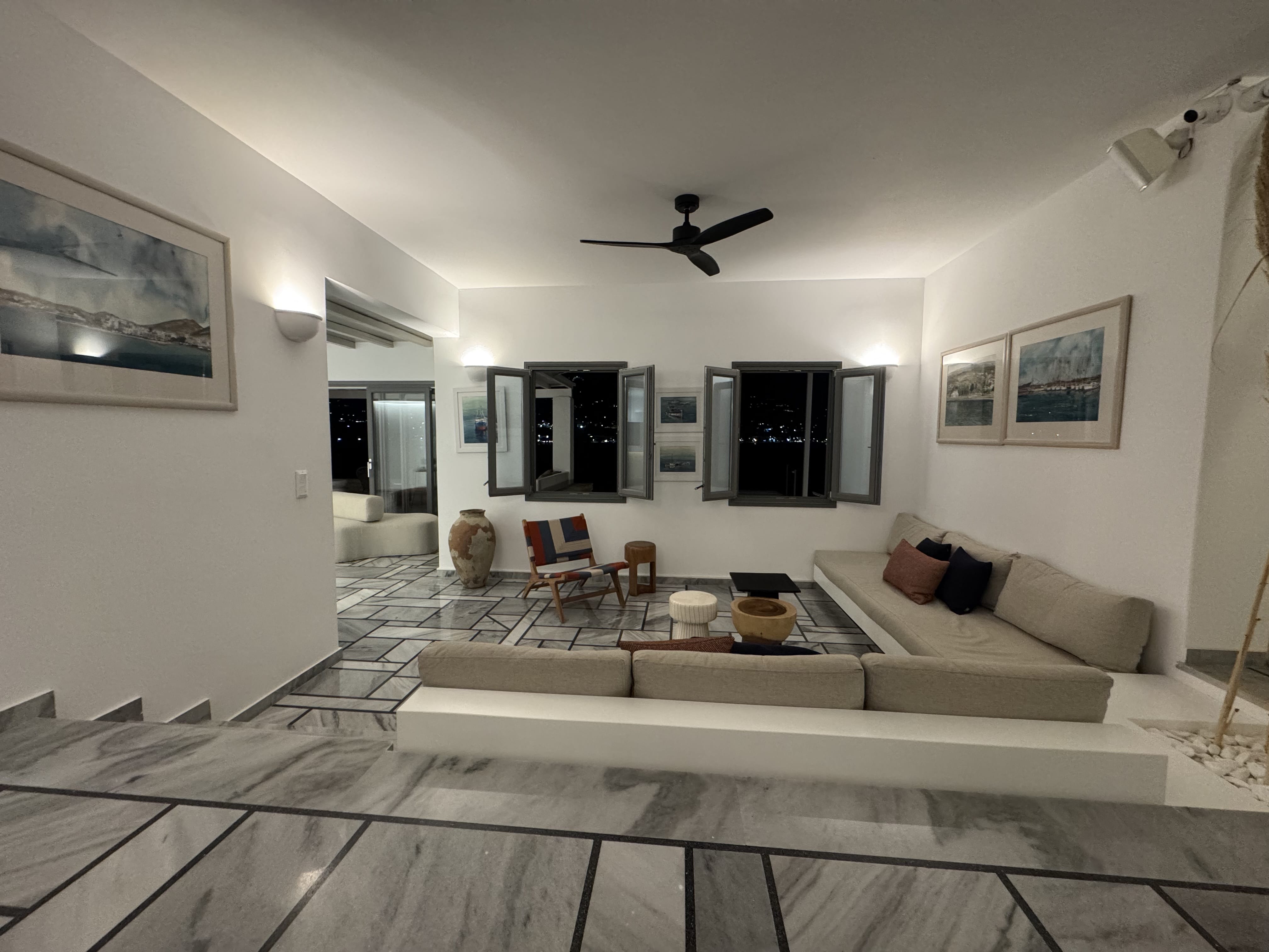 a living room with a large white floor