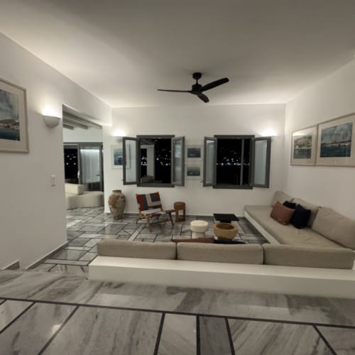 a living room with a large white floor