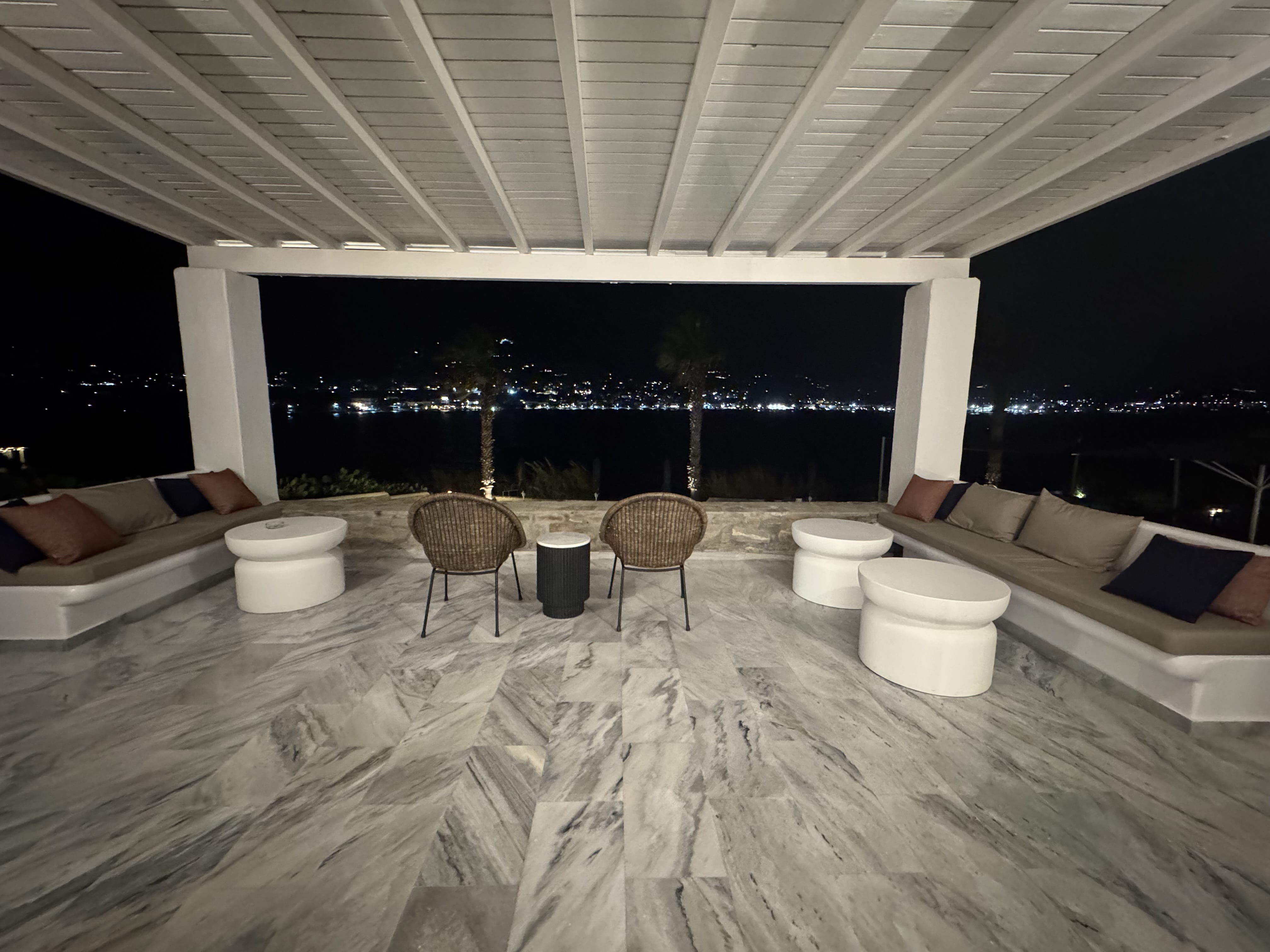 a room with a table chairs and a couch