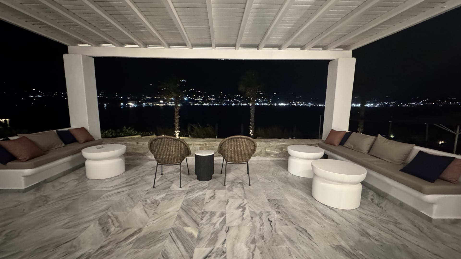 a room with a table chairs and a couch