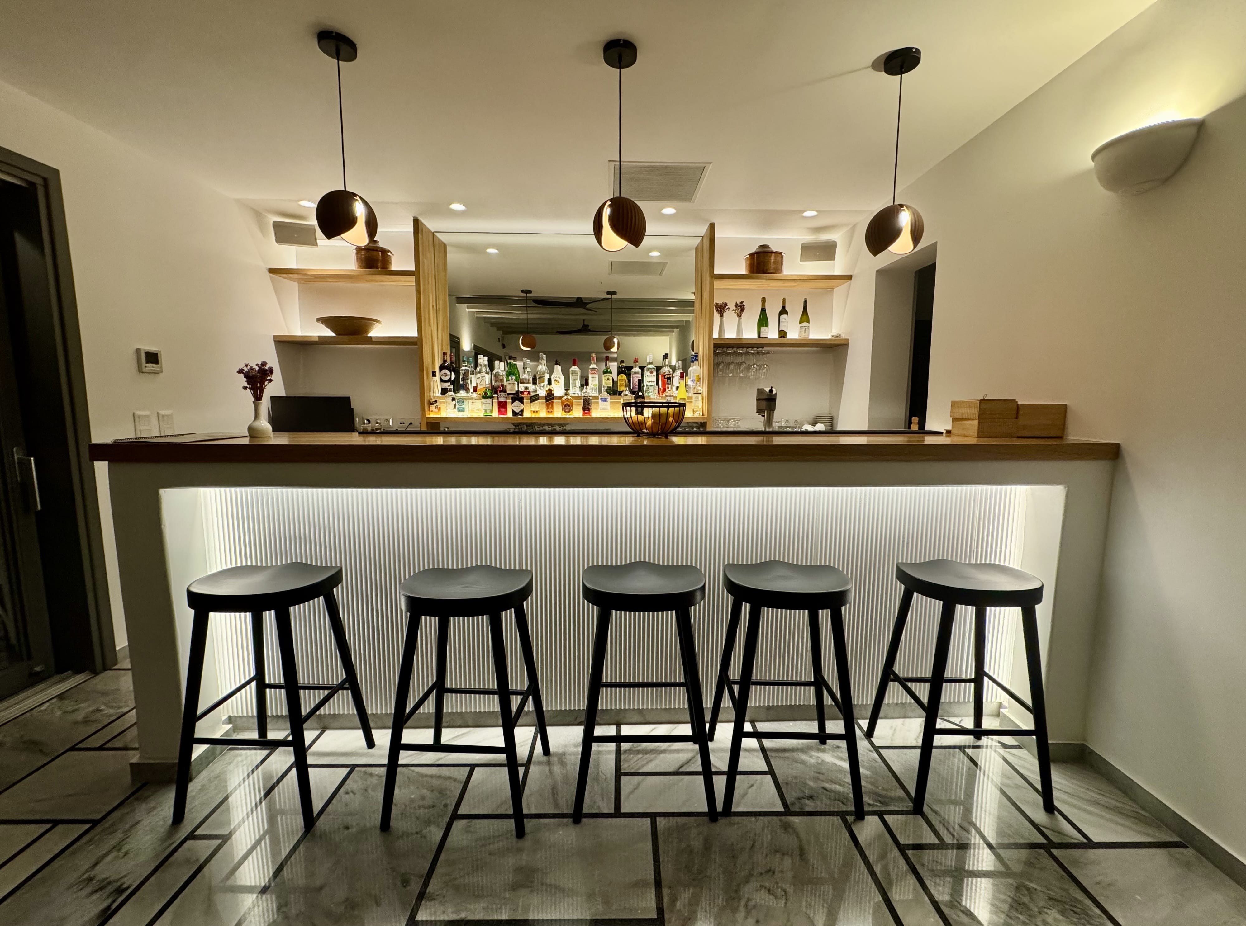a kitchen with stools