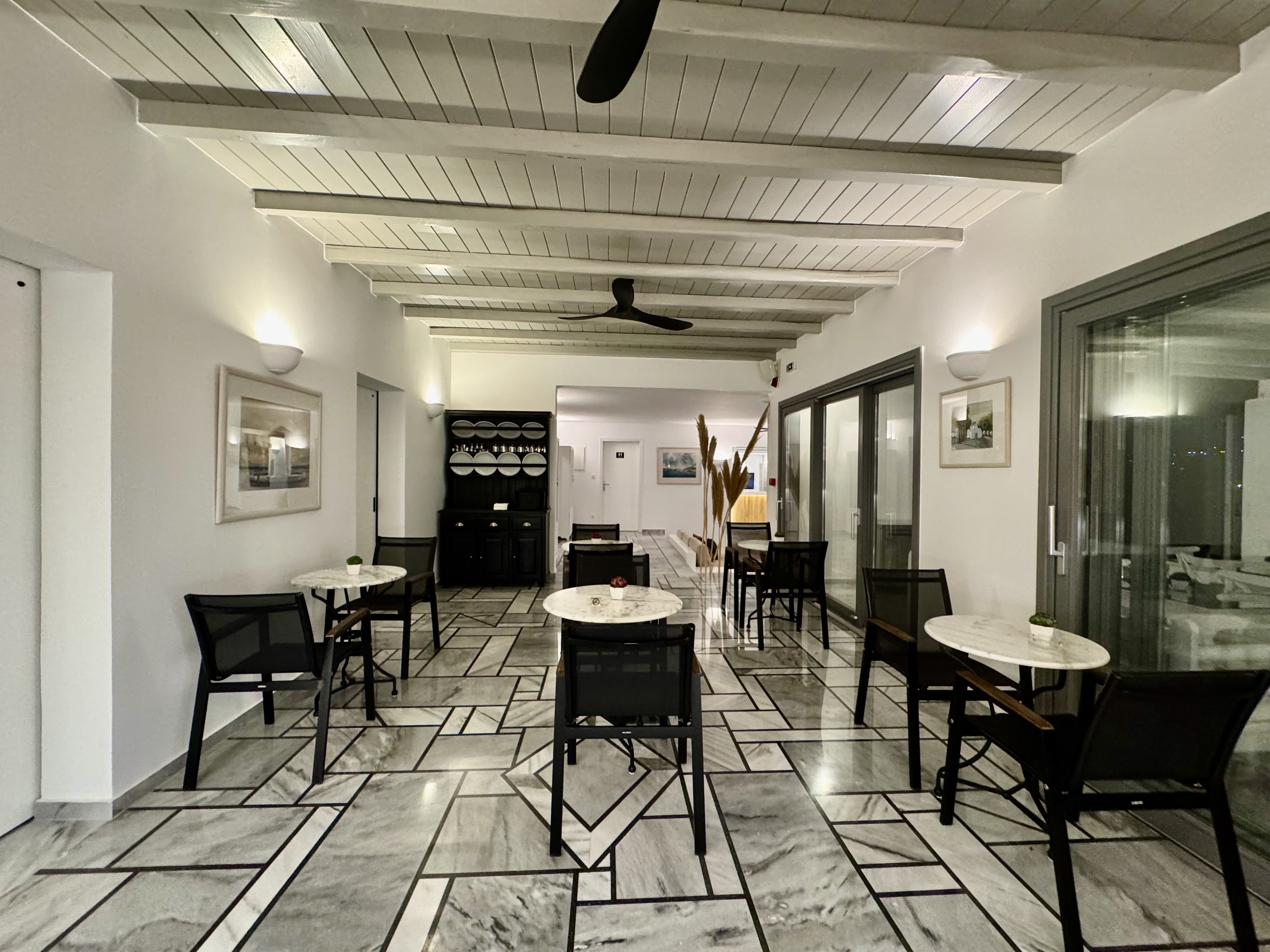 a room with tables and chairs