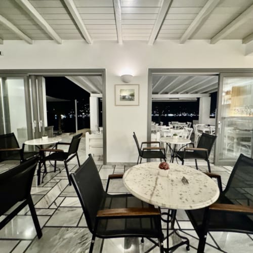 a room with tables and chairs