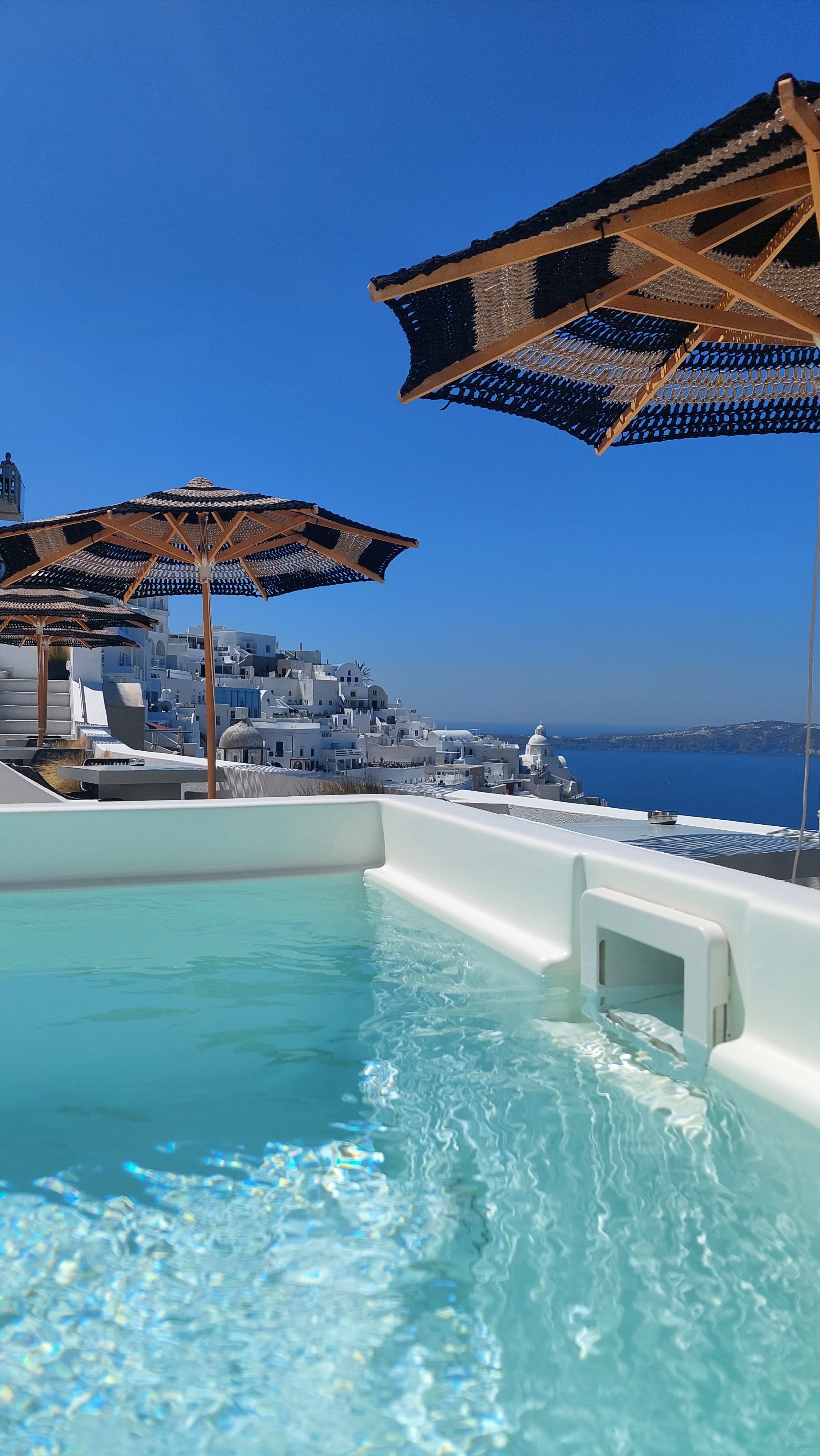 a pool with a building in the background