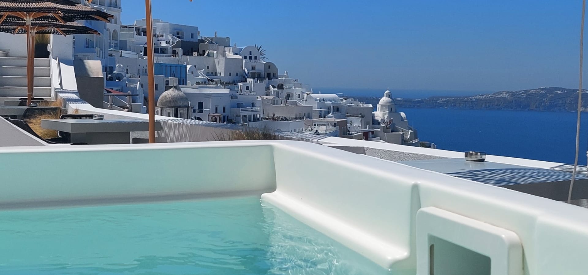a pool with a building in the background