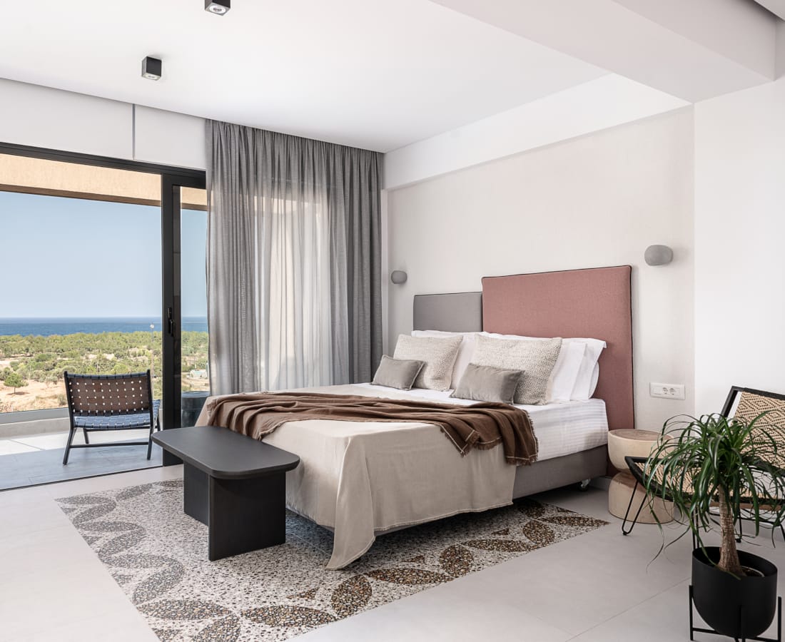 a bedroom with a large window